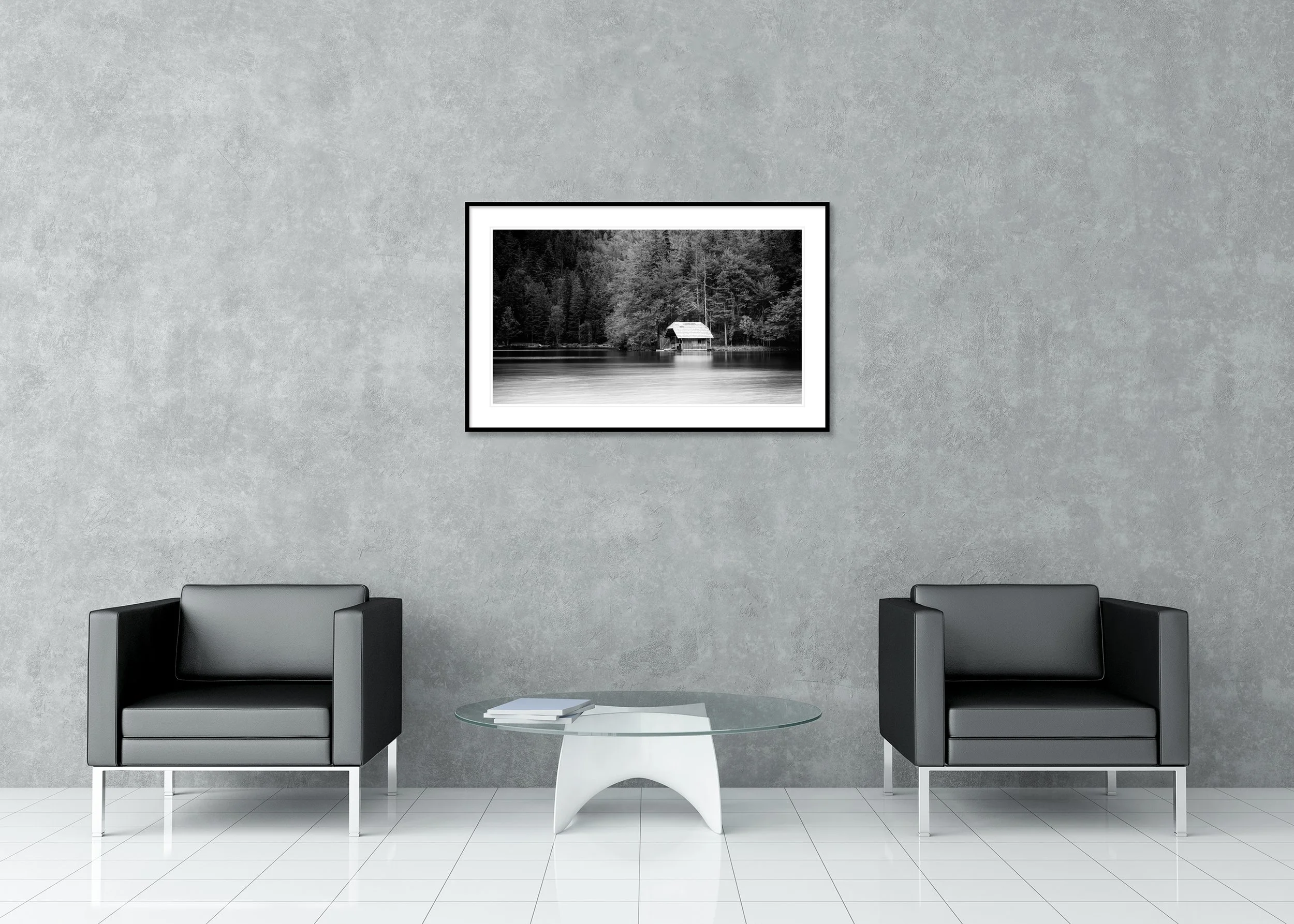 Wooden Boathouse Panorama displayed in a modern interior as an archival pigment print in a black aluminium frame with a white mount by Gerald Berghammer.