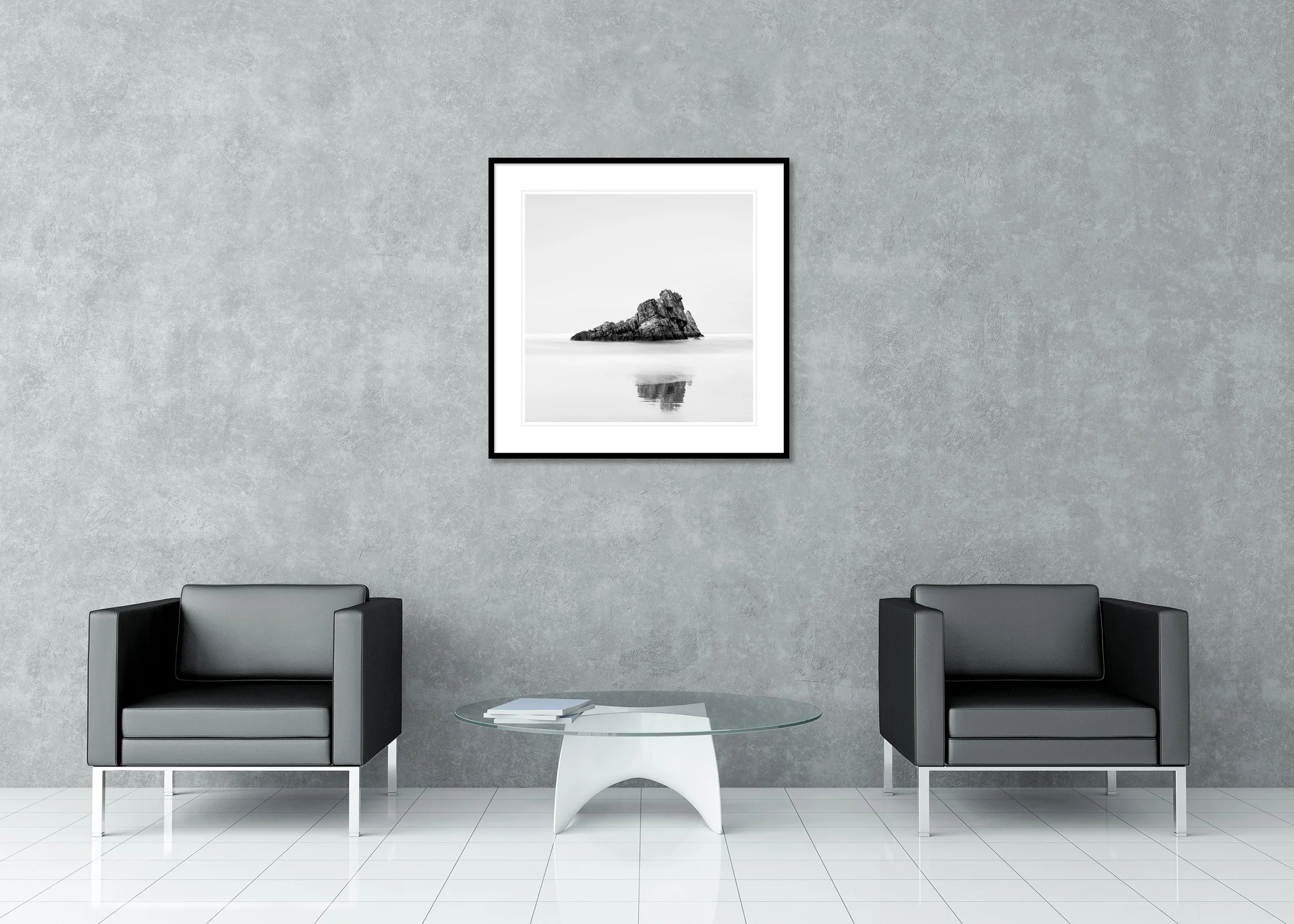 Rock on the Beach, Study 1 displayed in a modern lounge as an archival pigment print in a black aluminium frame with a white mount by Gerald Berghammer.