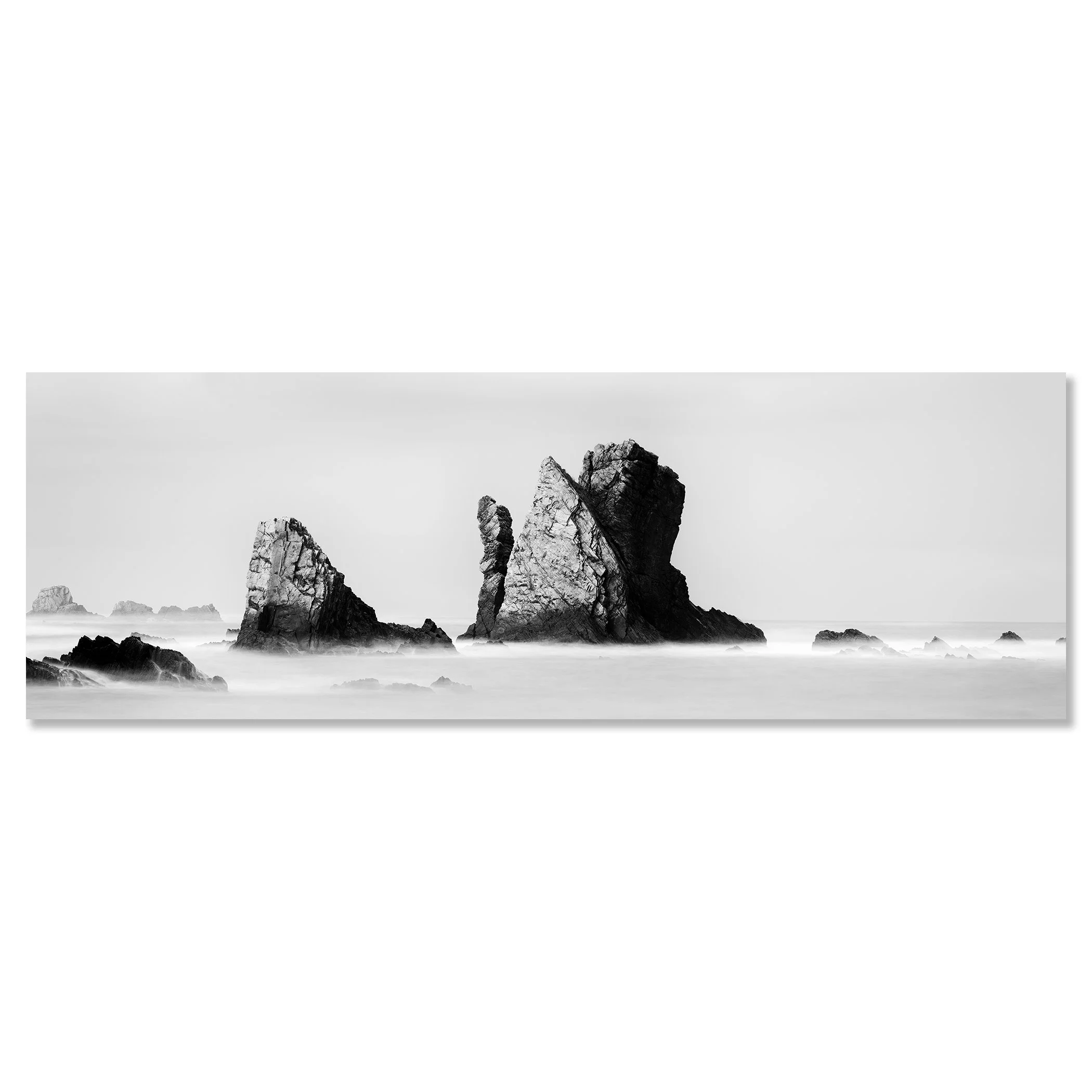 Black and white coastal seascape with jagged sea stacks in misty ocean water – dibond frameless