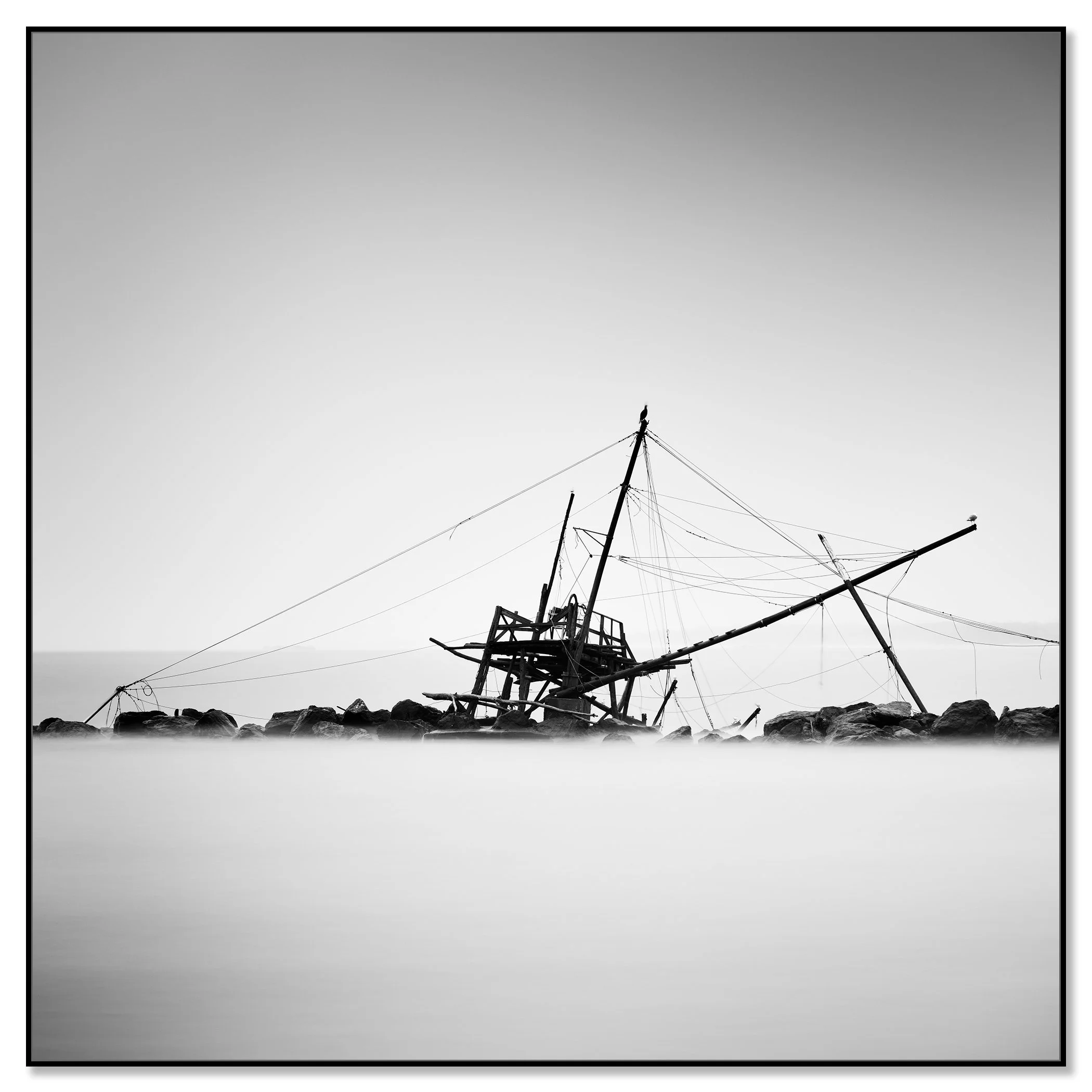 An abandoned fishing hut at Bocca d’Arno captured in black and white, with still water and a quiet coastal atmosphere – framed ArtBox black