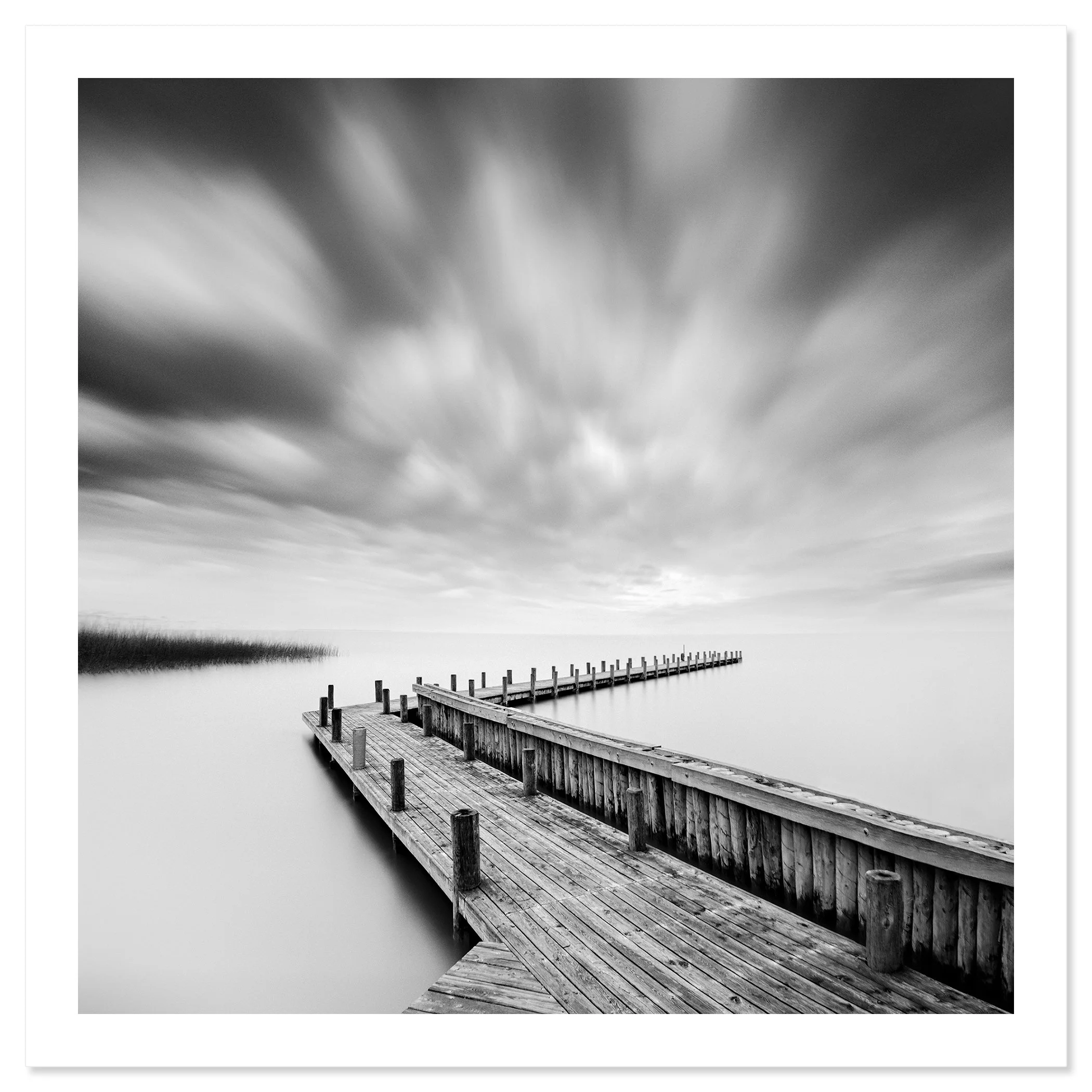 Wood Pier Study 1 by Gerald Berghammer, black-and-white fine art print depicting a weathered wooden pier on Lake Neusiedl.