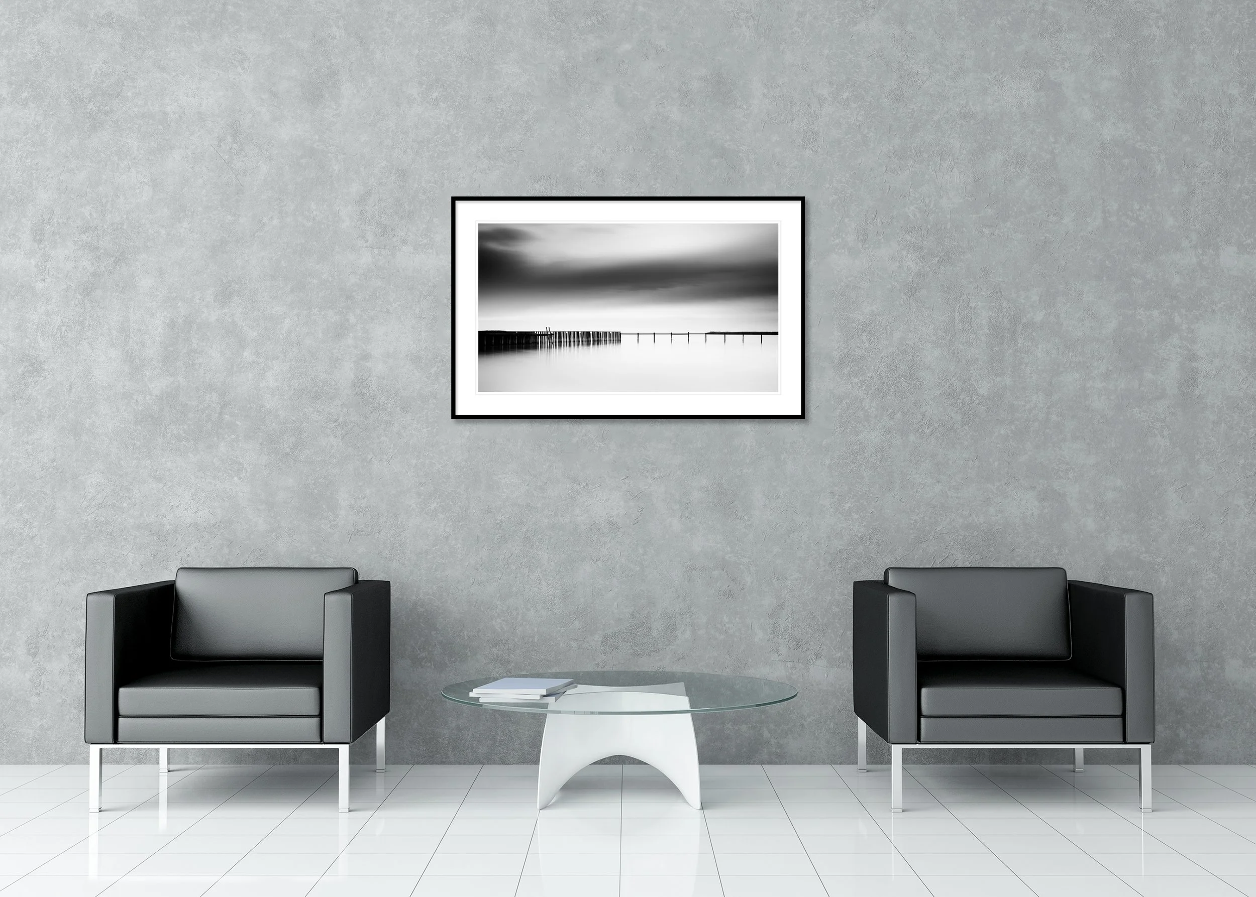 Monochrome panorama of calm water with a floating dock and distant pier, archival pigment print in a classic frame with a mount