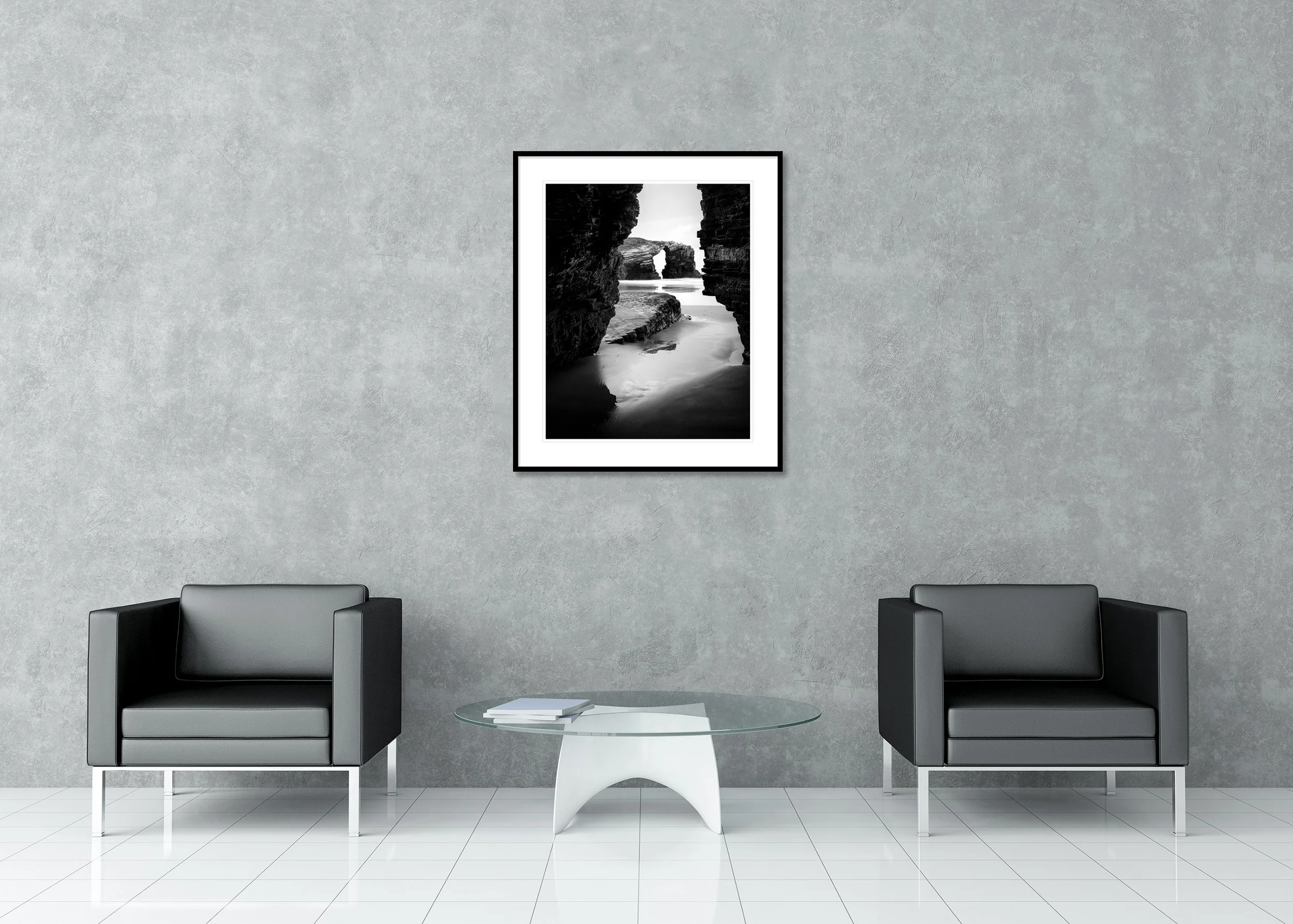Arches on Catedrais Beach Study 2 displayed in a modern interior as an archival pigment print in a black aluminium frame with a white mount by Gerald Berghammer.