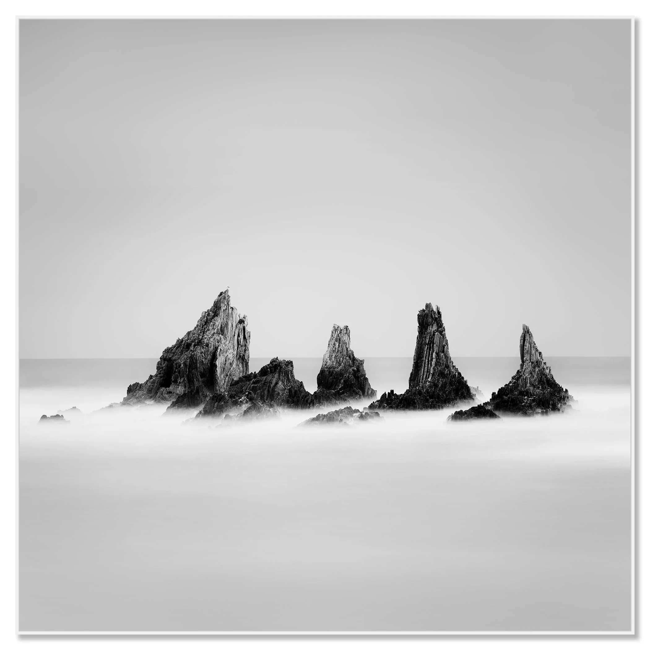 Rocky Peaks Study 1 by Gerald Berghammer, black-and-white Atlantic seascape presented in a white aluminium ArtBox frame.