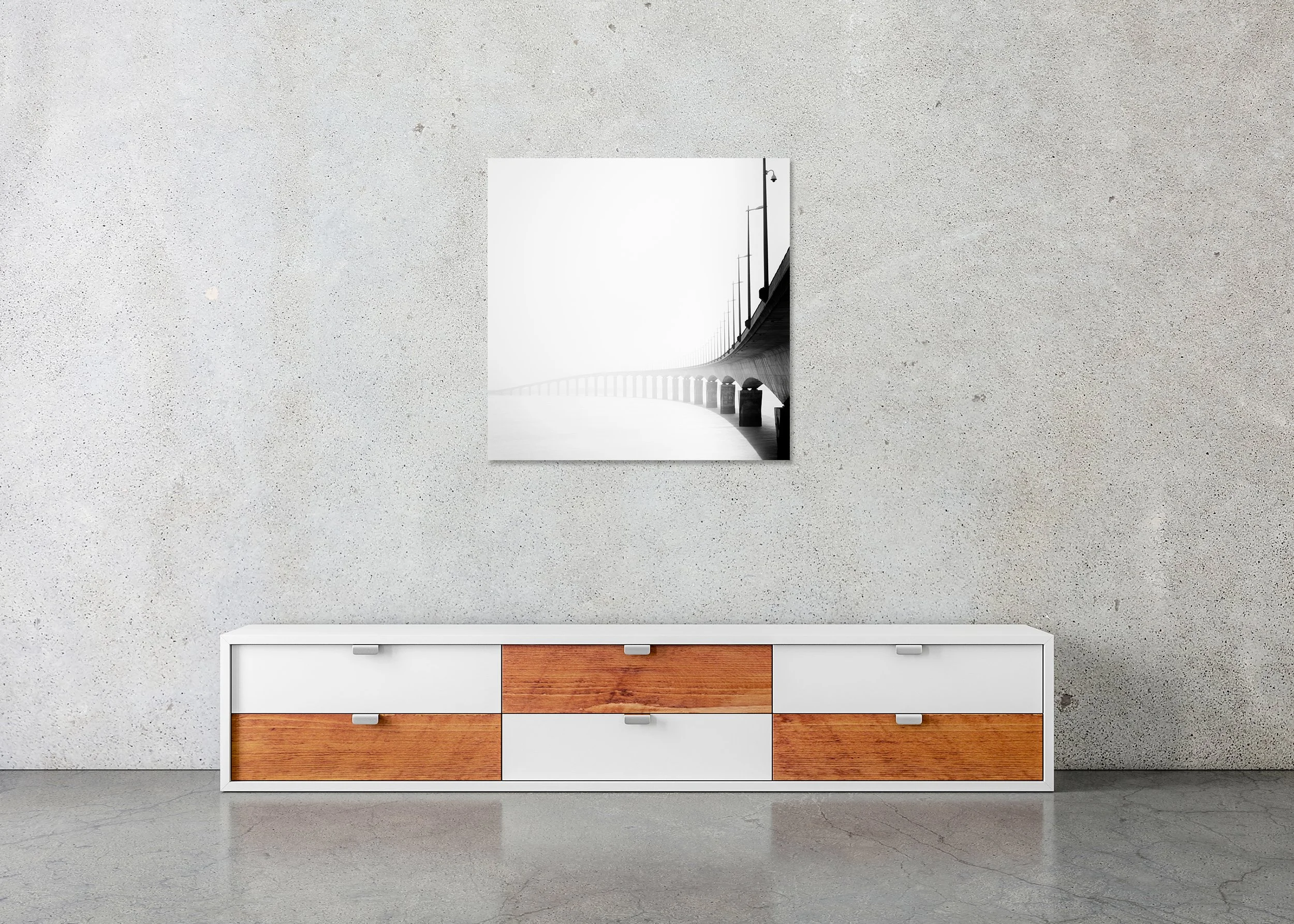 Pont de l’Île de Ré Study 1 displayed in a modern interior as a frameless black-and-white aluminium Dibond print by Gerald Berghammer.