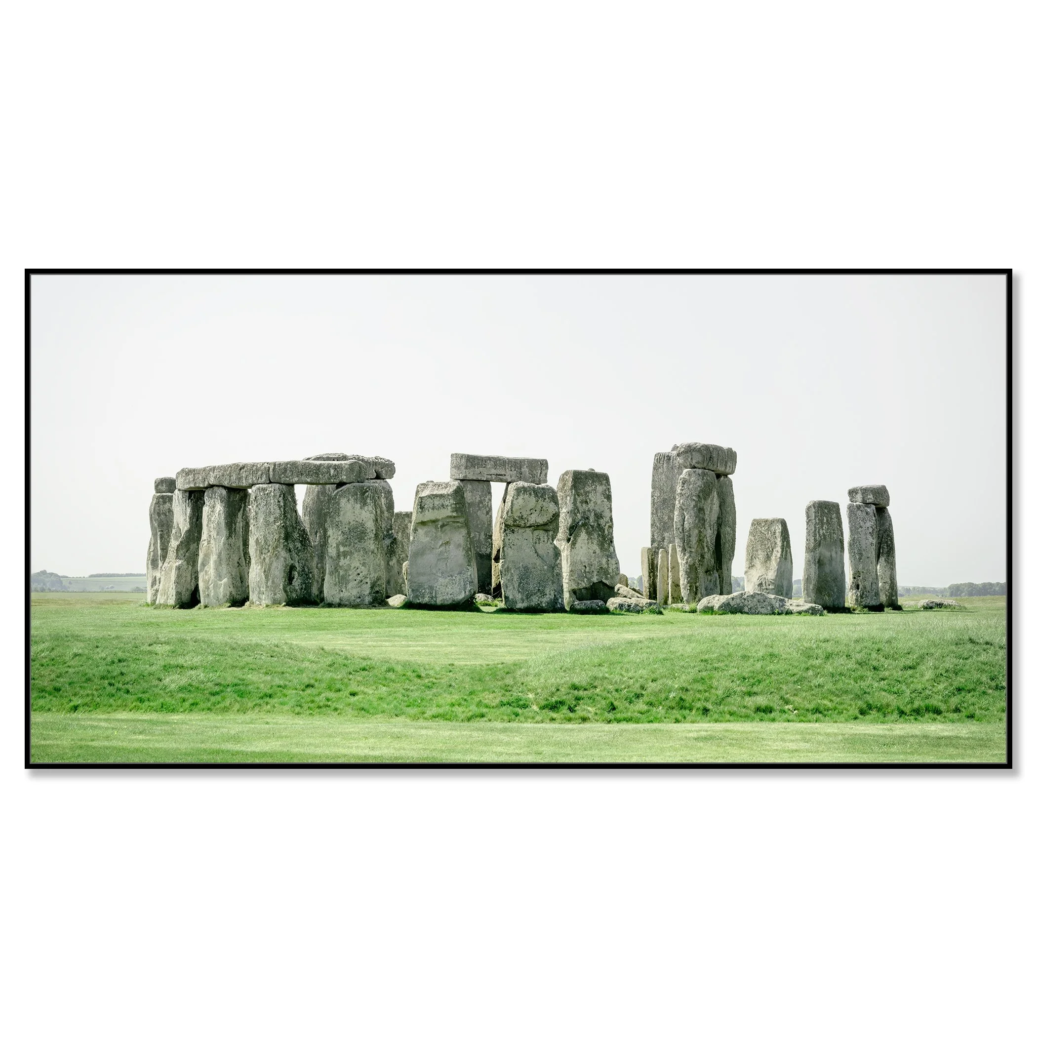 Gerald Berghammer - Color landscape panorama photography. Historic Stonehenge monument with large standing stones on a grassy field under a gray sky. Chromaluxe framed black