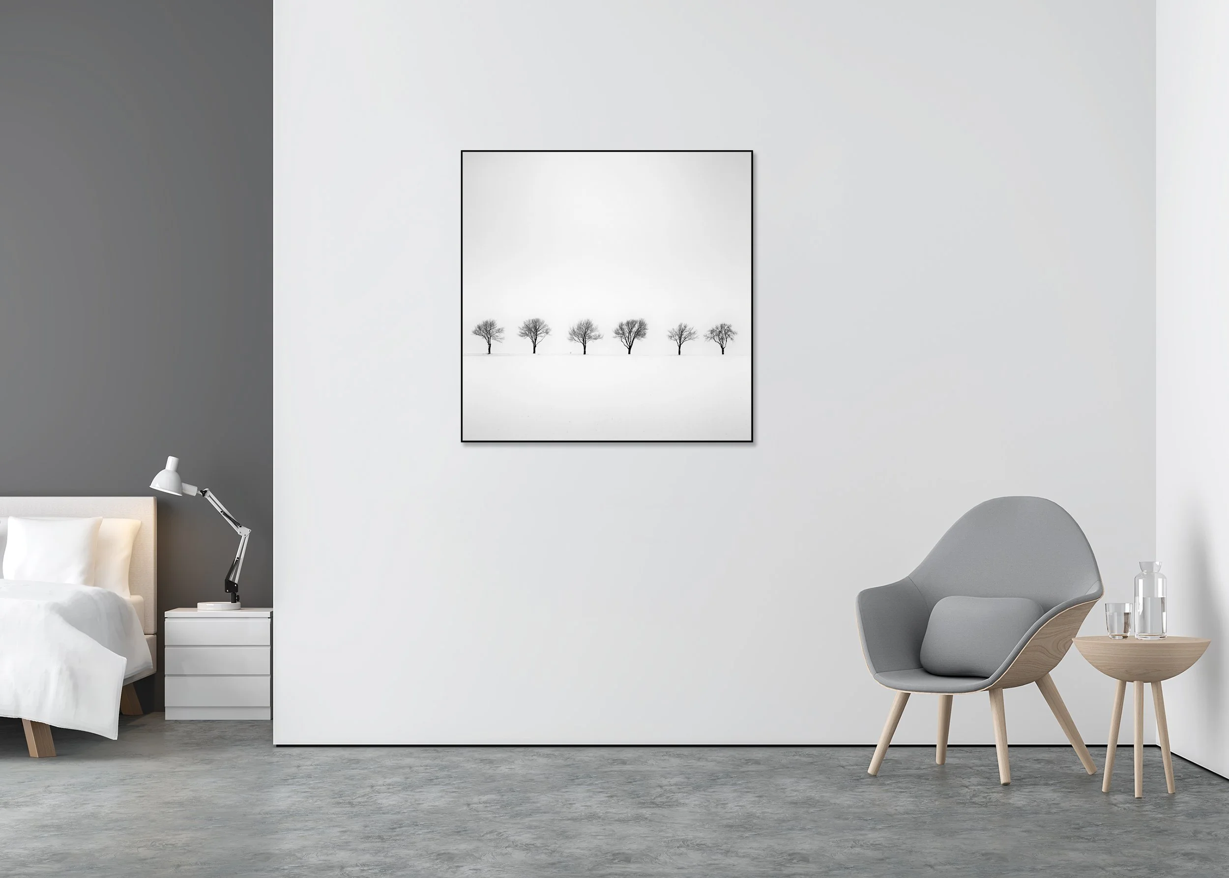 Trees in Snowy Field – Study 1 displayed in a modern bedroom interior, mounted on aluminium Dibond in a black ArtBox frame by Gerald Berghammer.