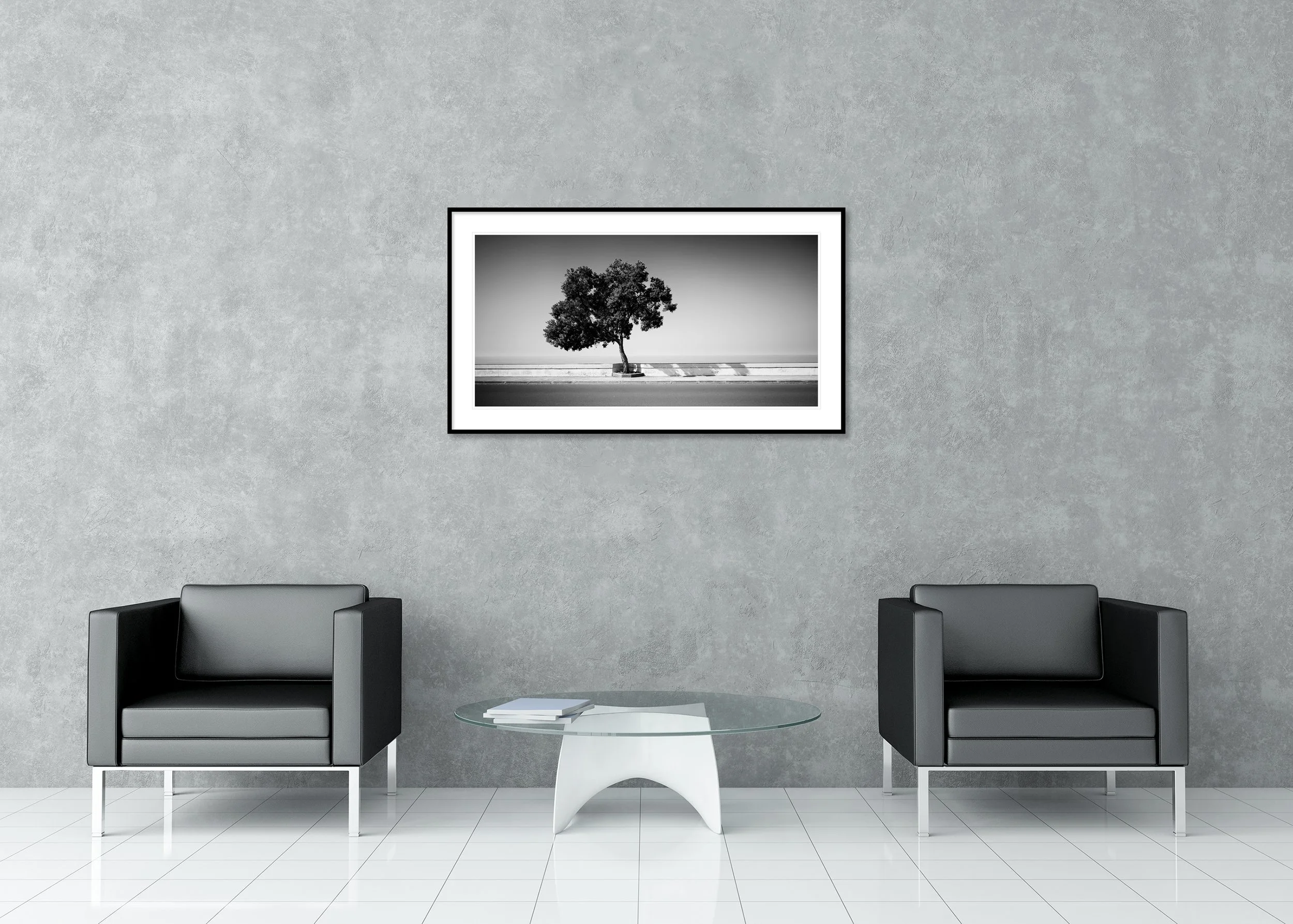 Tree by the Waterfront displayed in a modern interior as an archival pigment print in a black aluminium frame with a white mount by Gerald Berghammer.