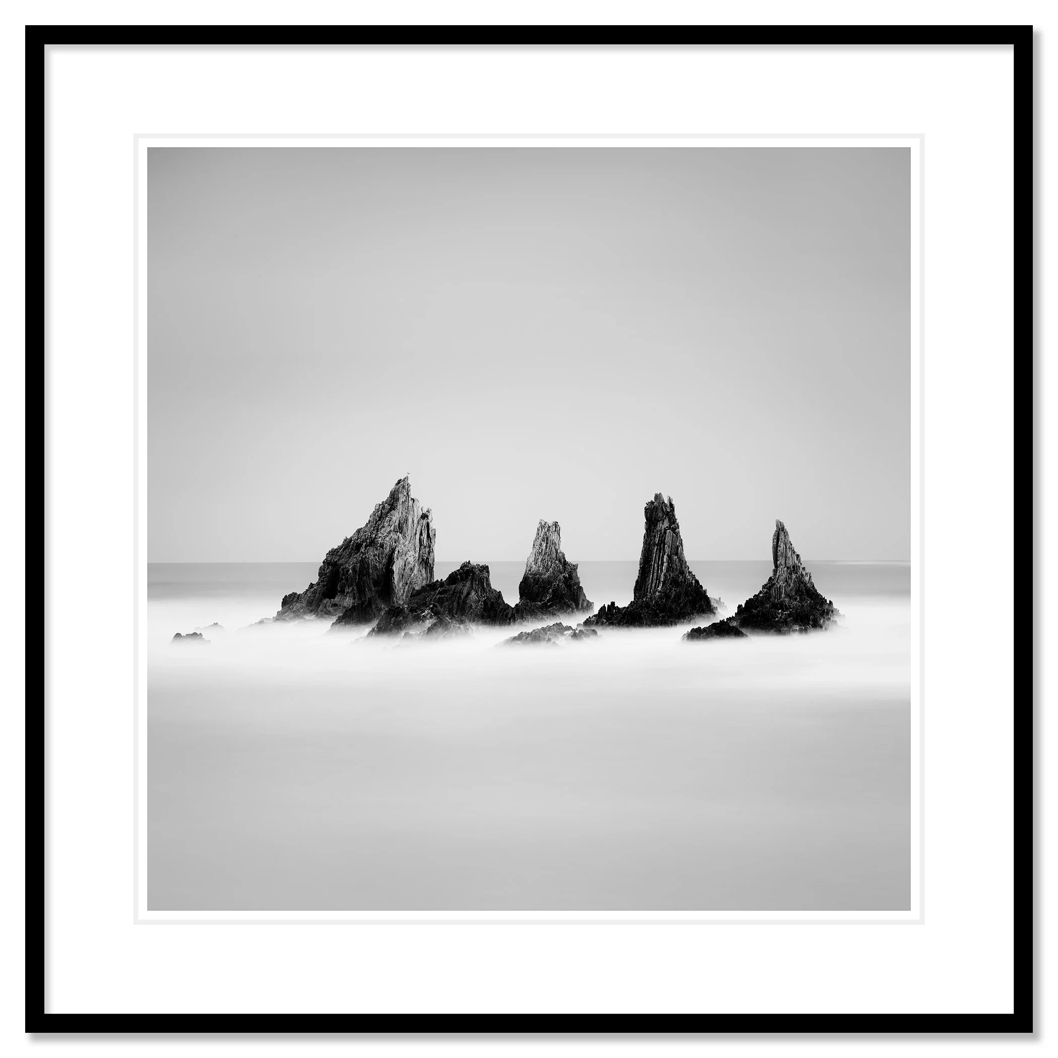 Rocky Peaks Study 1 by Gerald Berghammer, black-and-white fine art photograph of Spanish sea stacks in a black aluminium frame with white mount.
