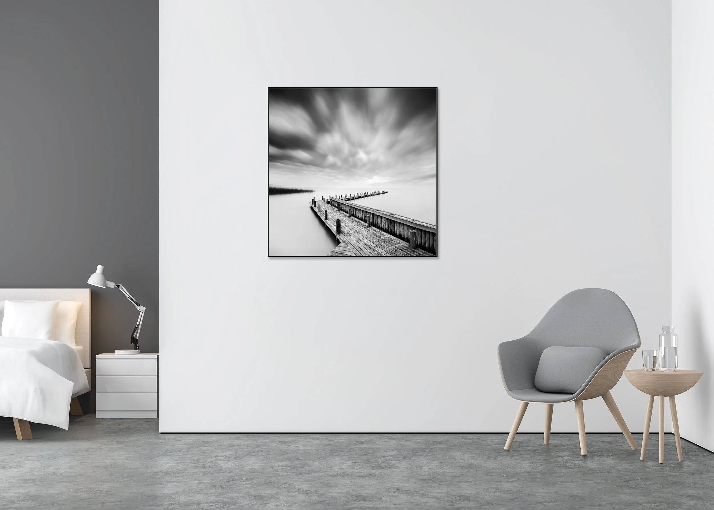 Black and white fine art photo of a wooden pier on a calm lake under dramatic clouds, mounted to Dibond in an aluminium ArtBox
