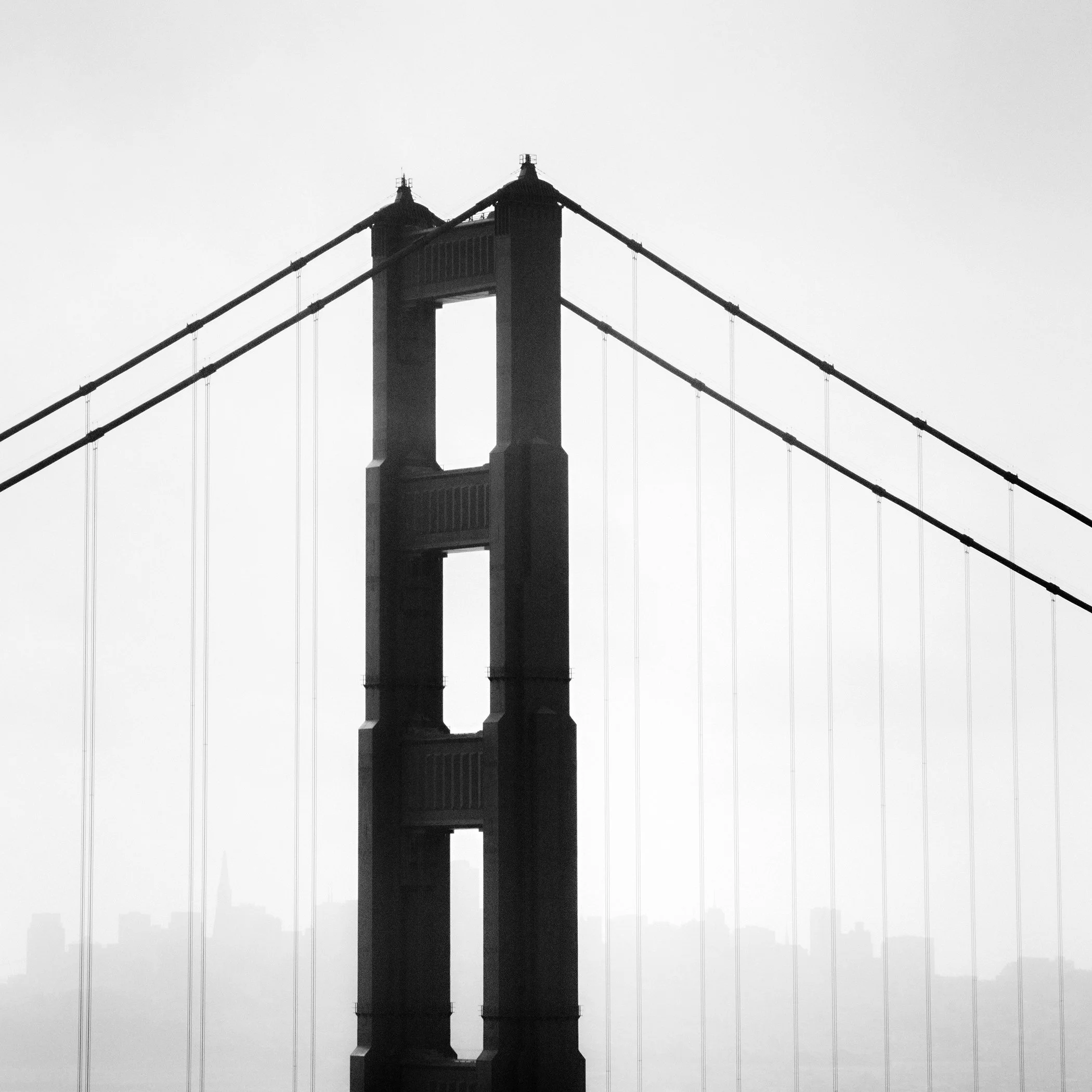 Golden Gate Study 18, an analogue black-and-white photograph of the Golden Gate Bridge and San Francisco skyline by Gerald Berghammer.