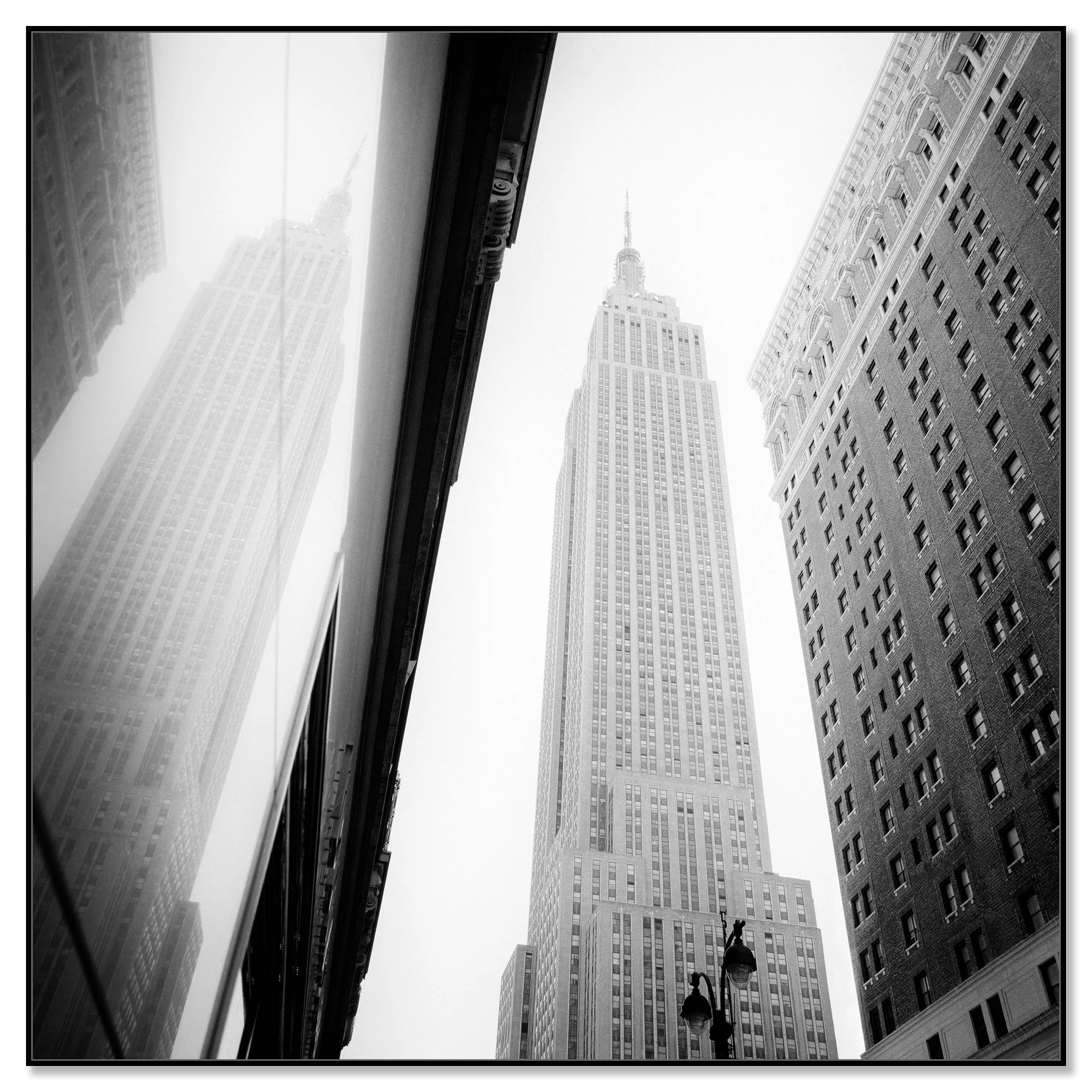 Empire State Building Study 1 by Gerald Berghammer mounted on aluminium Dibond in a black ArtBox frame.