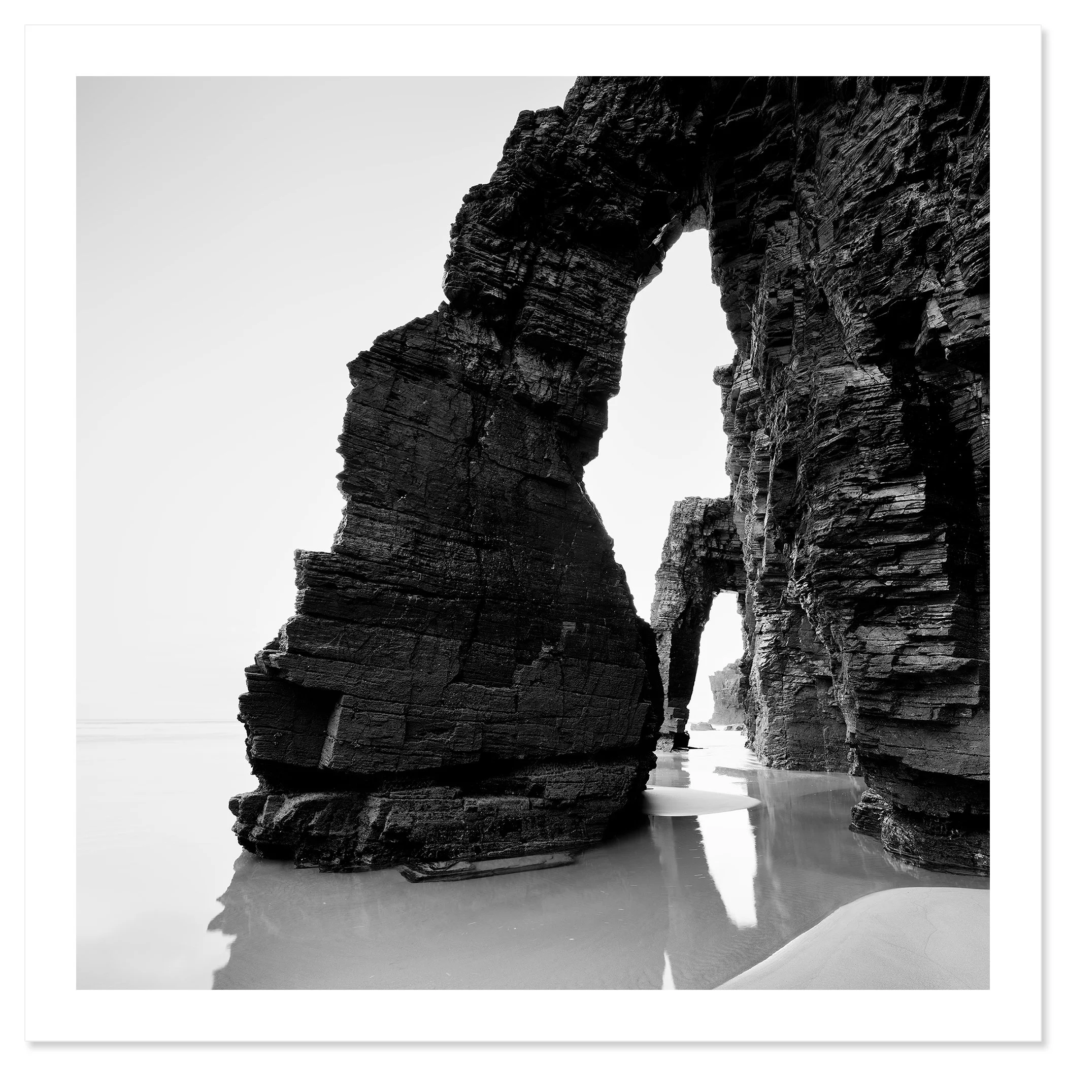 Arches on Catedrais Beach Study 4 shown as an archival pigment print with white border by Gerald Berghammer.