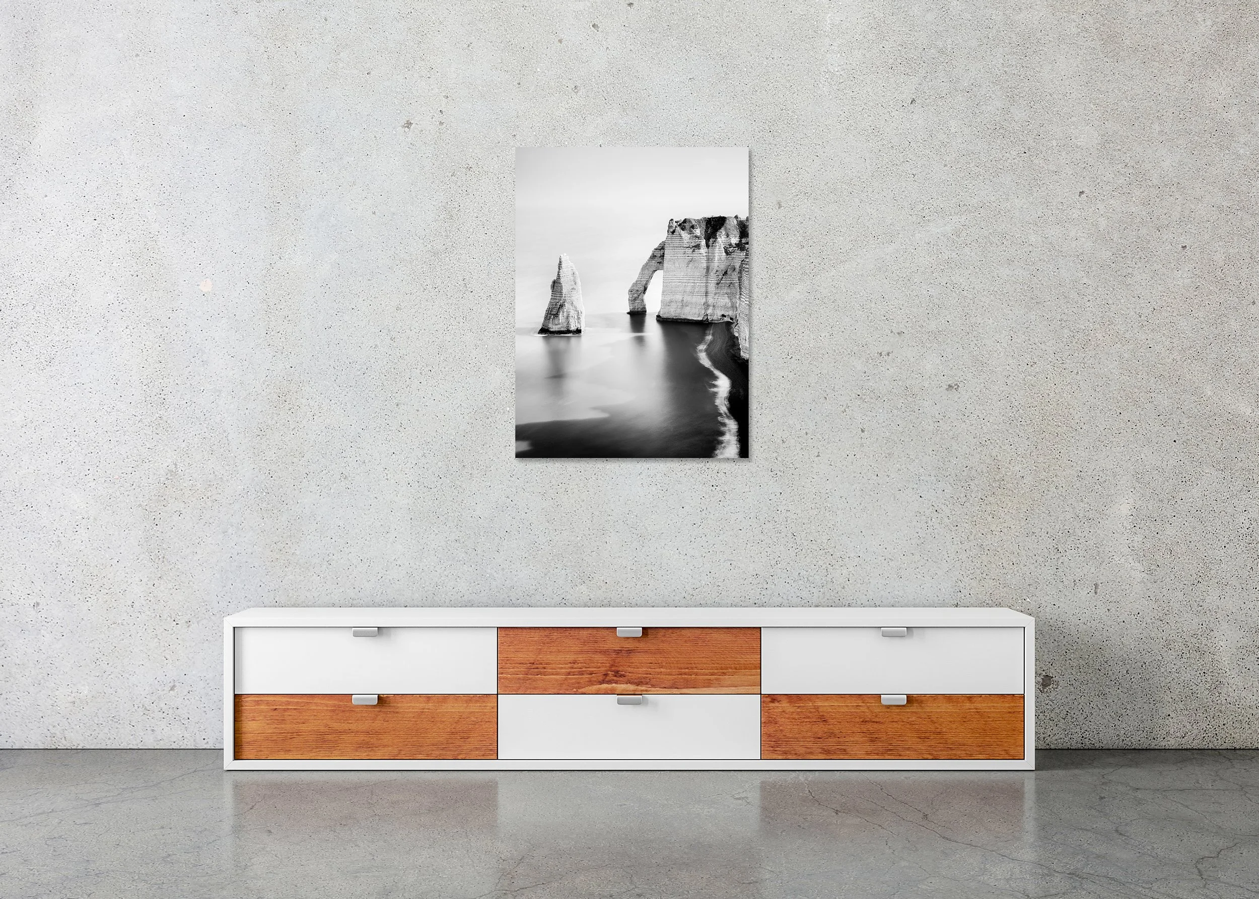 The Cliffs of Étretat, Study 3 – frameless black-and-white photograph on aluminium Dibond displayed in a minimalist interior. Photo by Gerald Berghammer.