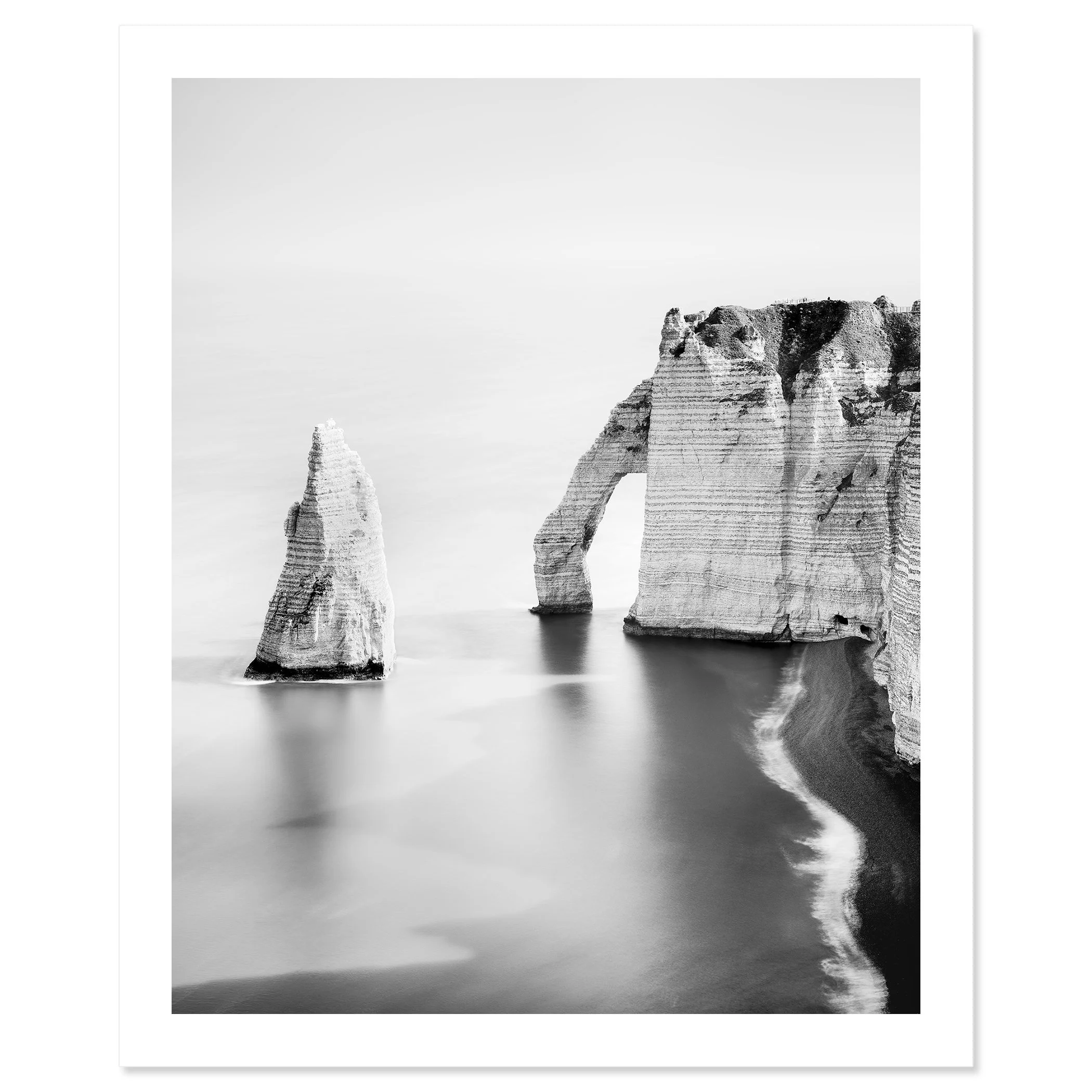 The Cliffs of Étretat, Study 3 by Gerald Berghammer, black-and-white fine art print on Baryta paper with a white border, depicting the sea arch in Normandy, France.