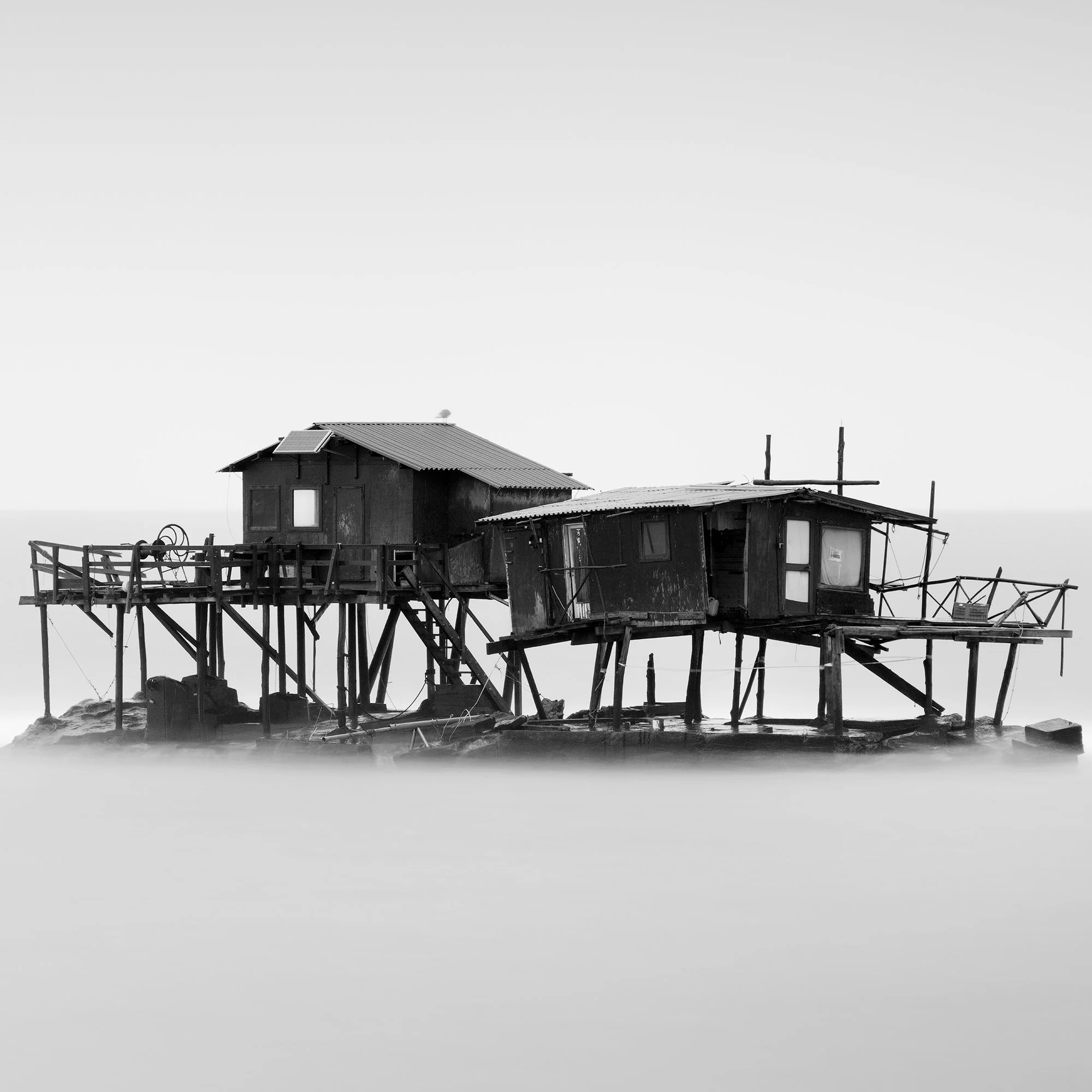 Close-up detail of the wooden stilt fishing huts in Marina di Pisa Study 1, Tuscany, Italy, by Gerald Berghammer.