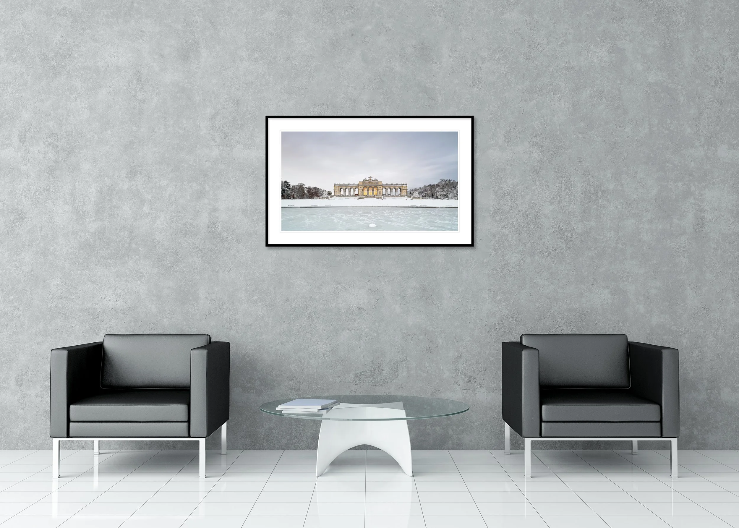 Snow-Covered Gloriette displayed in a modern interior as an archival pigment print in an aluminium frame with a white mount. Photo by Gerald Berghammer.