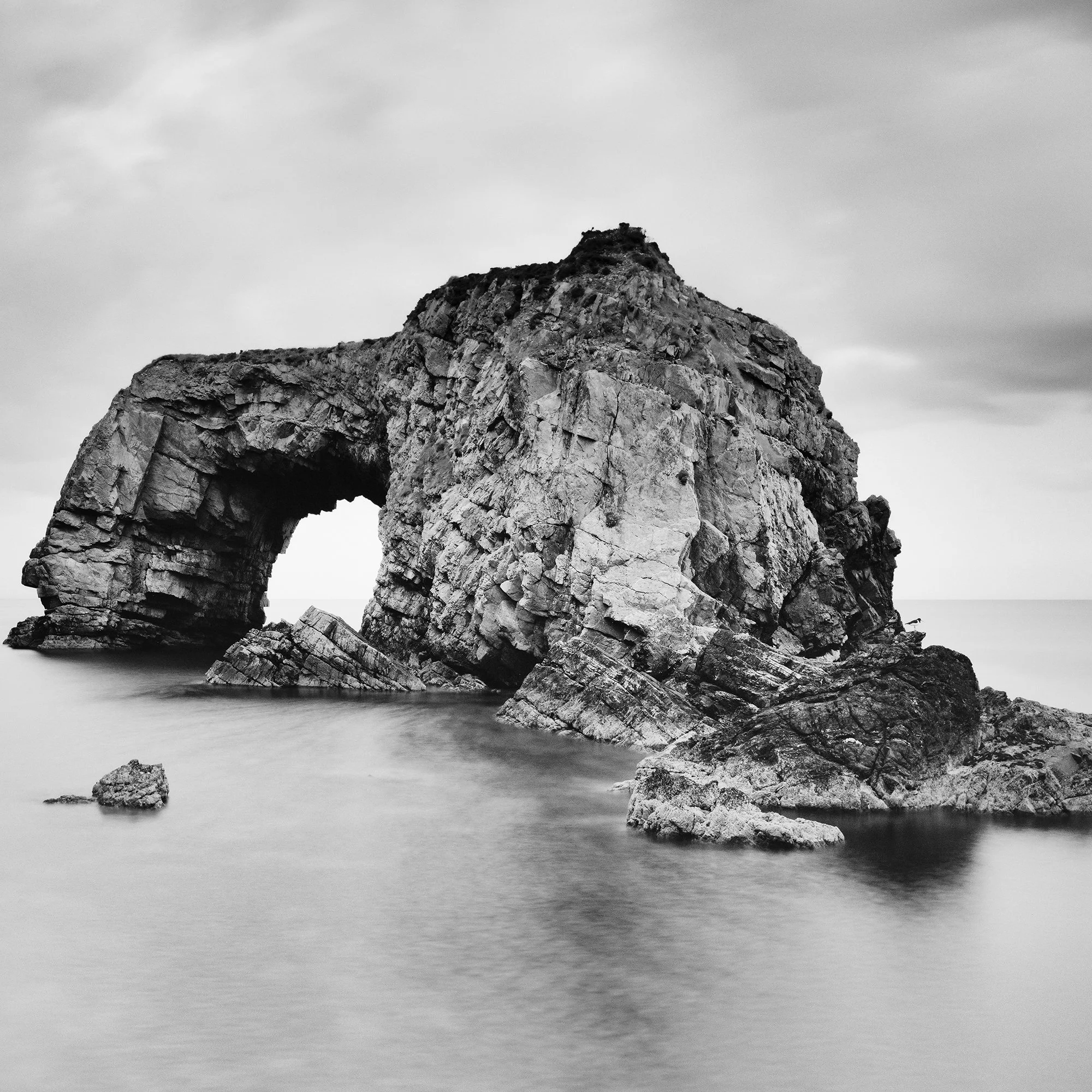 Close-up of Great Pollet Sea Arch Study 3 showing the textured natural sea arch and surrounding rocks in Ireland by Gerald Berghammer.