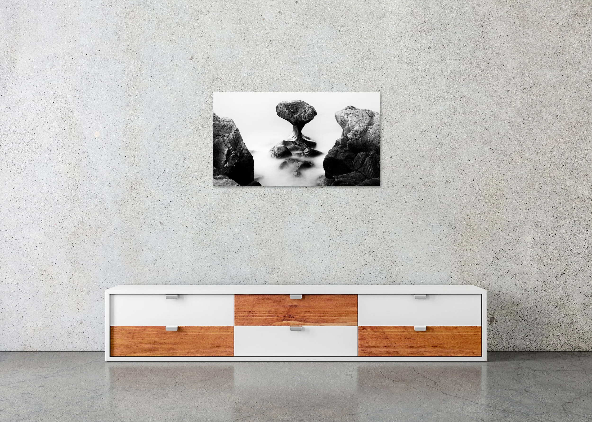 Mushroom-shaped rock formation on calm water, shown as a frameless ChromaLuxe metal print.