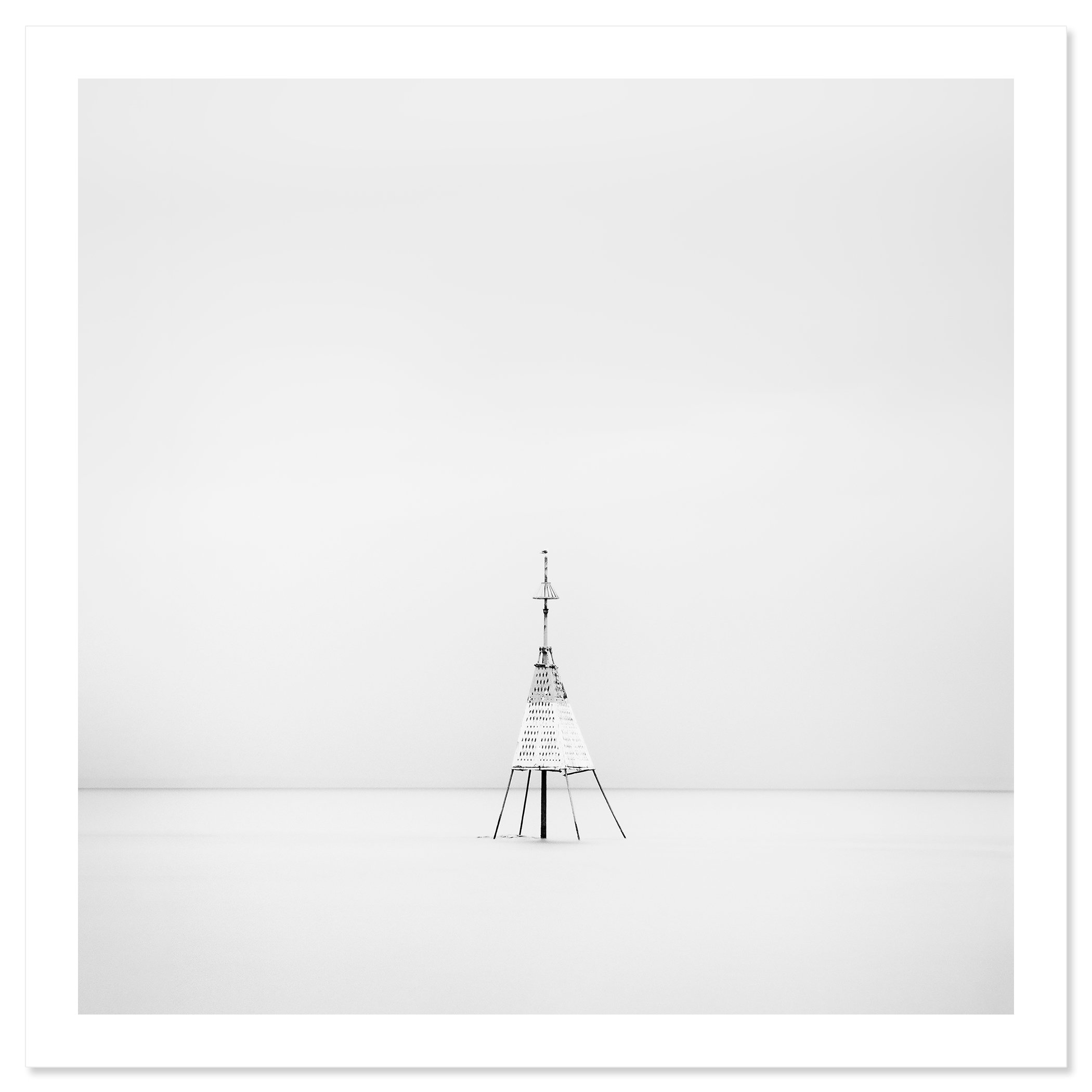 Gerald Berghammer - Black and white long exposure seascape photography. Solitary metal structure lighthouse with a conical top, standing in the Ocean. Fine art print only