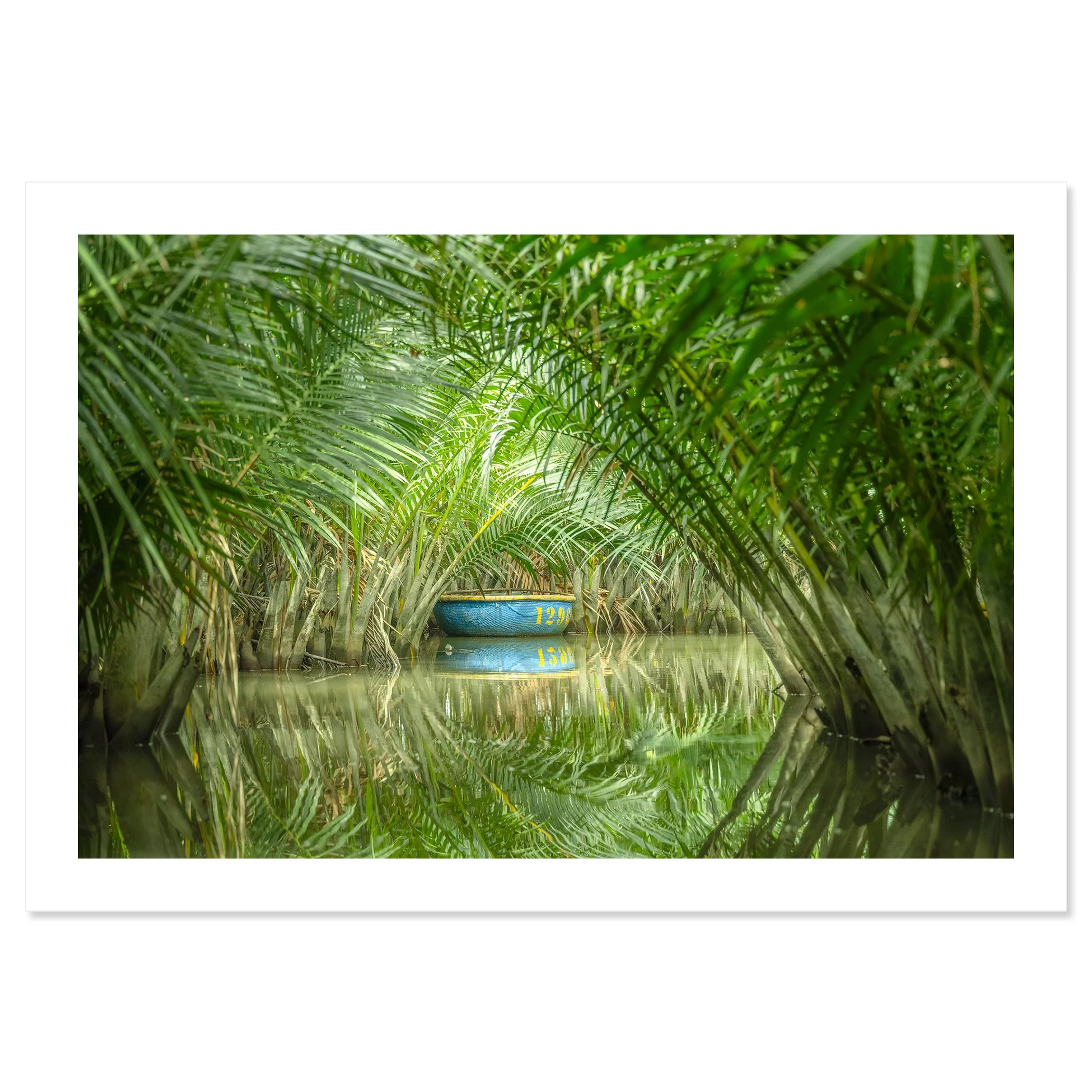 © 2025 Gerald Berghammer - Color waterscape photography. A small coconut boat among dense green nipa palm trees on a calm water body, with its reflection visible. Fine art print only