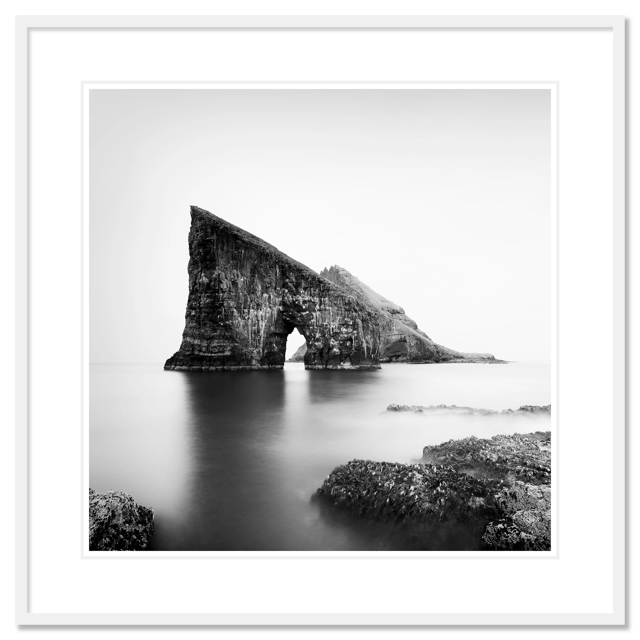 Drangarnir Sea Stacks Study 2 by Gerald Berghammer in a white aluminium frame with a white mount.