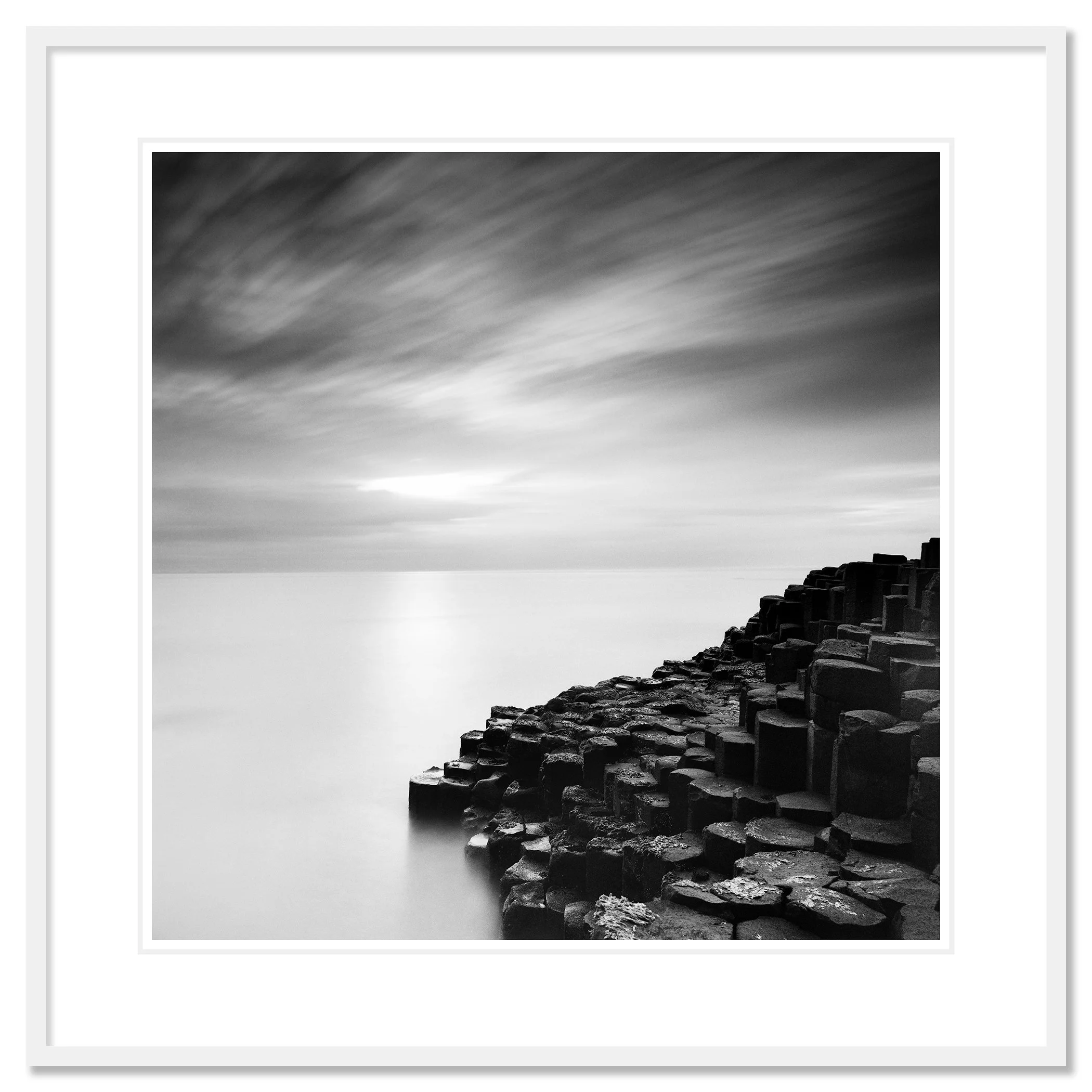 Giant’s Causeway Study 3 by Gerald Berghammer, black-and-white fine art print in a white aluminium frame with white mount.