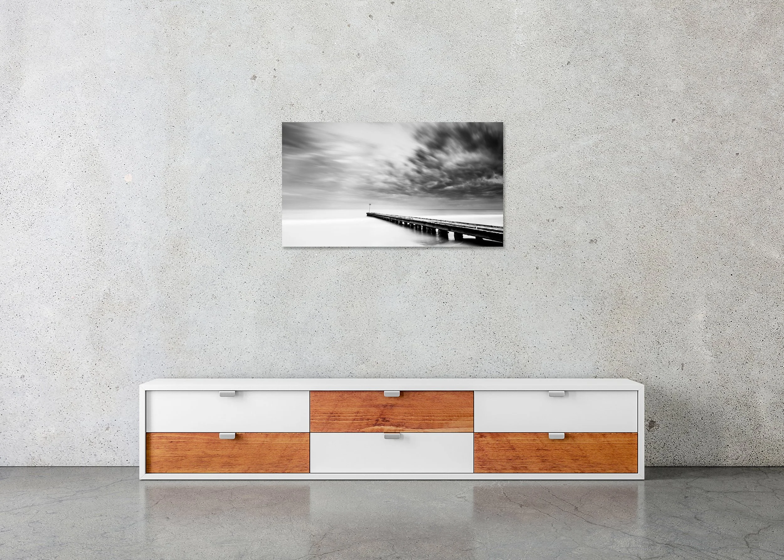 Stormy Adriatic Sea Panorama displayed in a modern interior as an archival pigment print in a black aluminium frame with a white mount by Gerald Berghammer.