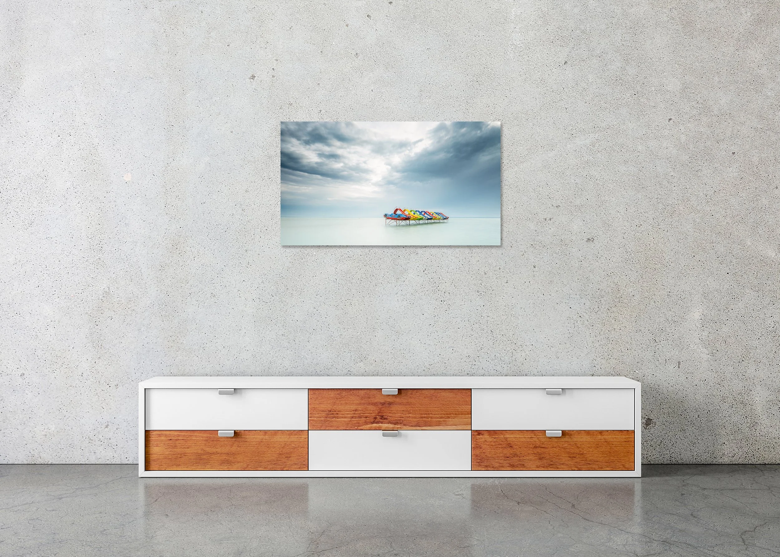 Row of Colourful Pedal Boats, Panorama – frameless colour photograph on aluminium Dibond displayed above a low cabinet.
