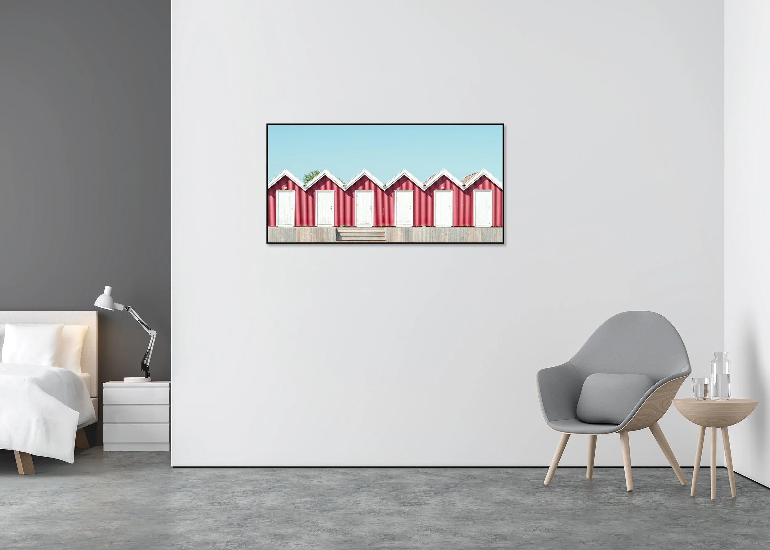 Red Beach Huts Study 1 displayed in a modern bedroom as a Dibond print in a black aluminium ArtBox frame by Gerald Berghammer.