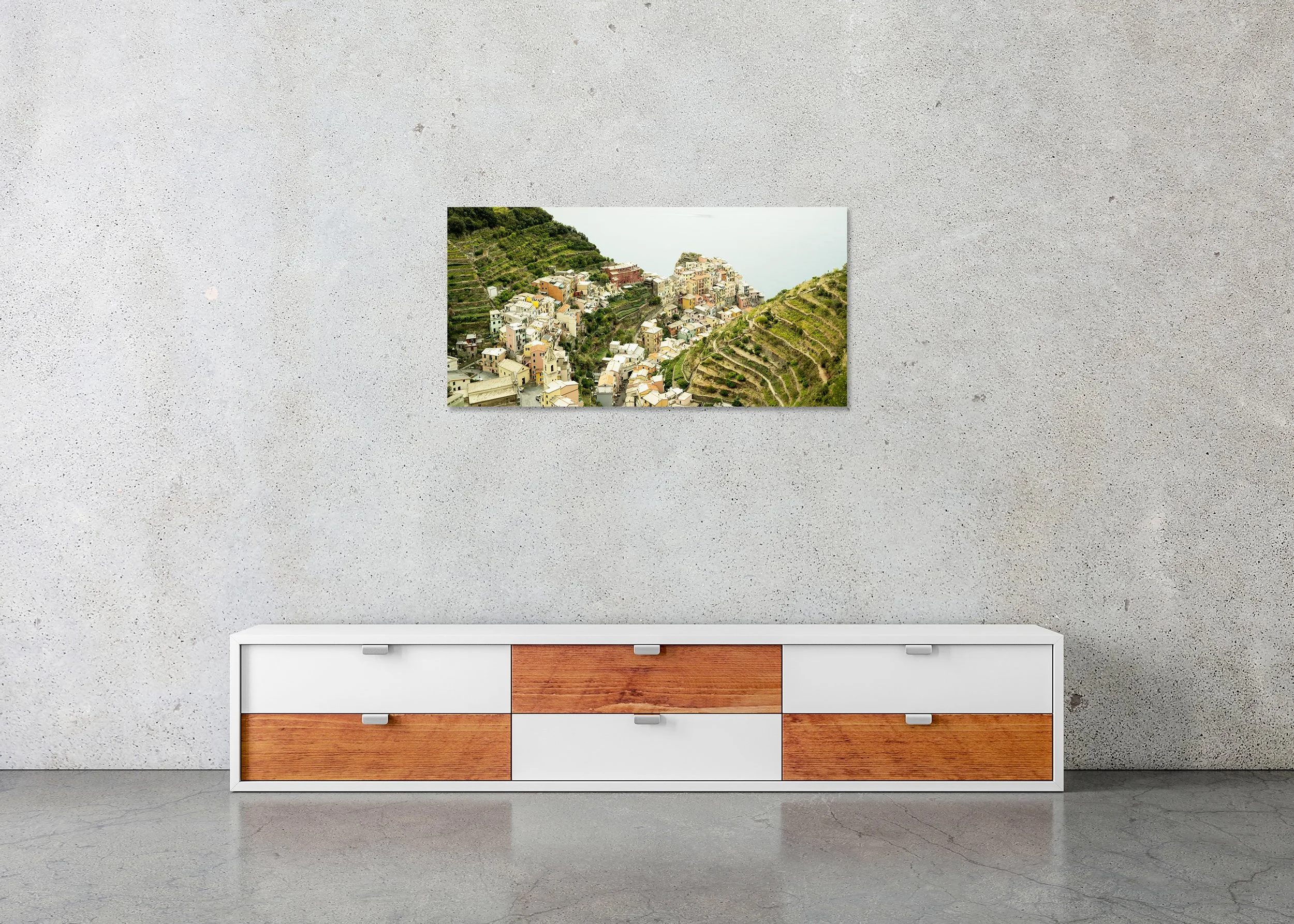 Picturesque Village Study 2 displayed in a modern interior as a frameless colour artwork mounted on aluminium Dibond by Gerald Berghammer.