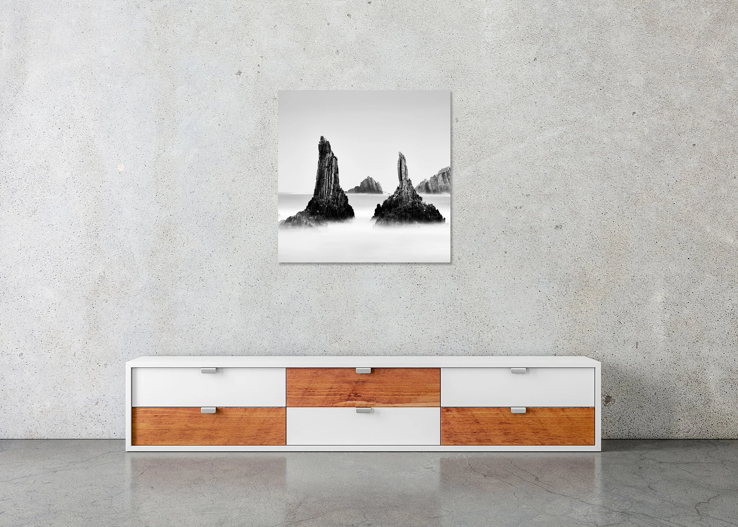 Fine art black-and-white coastal detail of rocky peaks along the Spanish coastline, a minimalist seascape as a photo print mounted to Dibond, frameless.