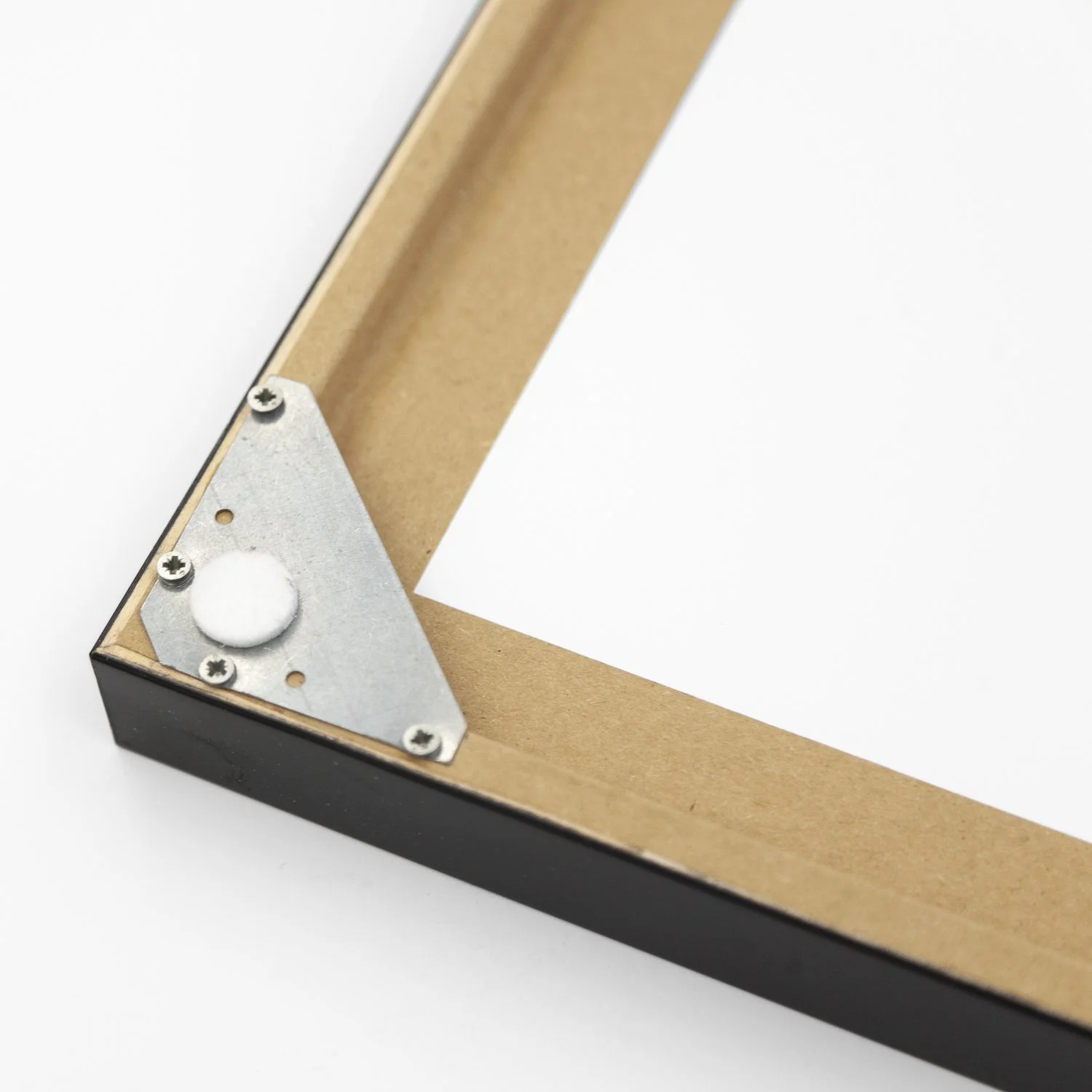 Reverse corner detail of Into the Wild by Gerald Berghammer, showing the metal corner fitting and protective bumper on the wooden frame.