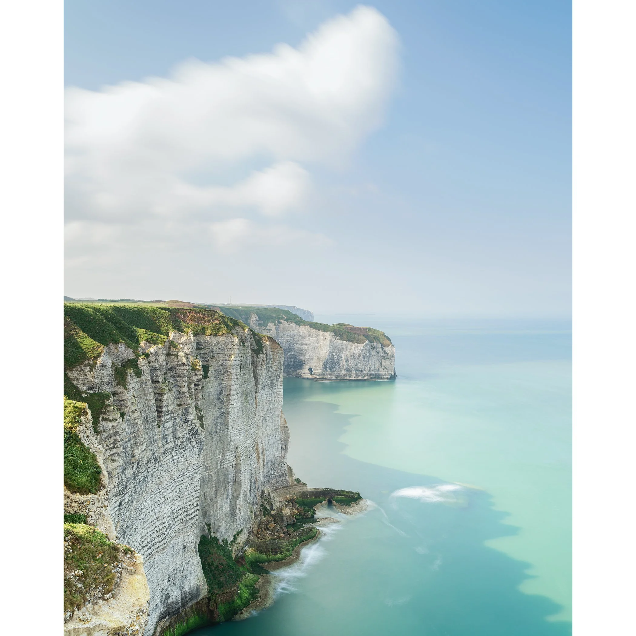 White Cliffs of Étretat Study 2, long-exposure colour photograph of chalk cliffs and turquoise sea on Normandy’s Alabaster Coast by Gerald Berghammer.