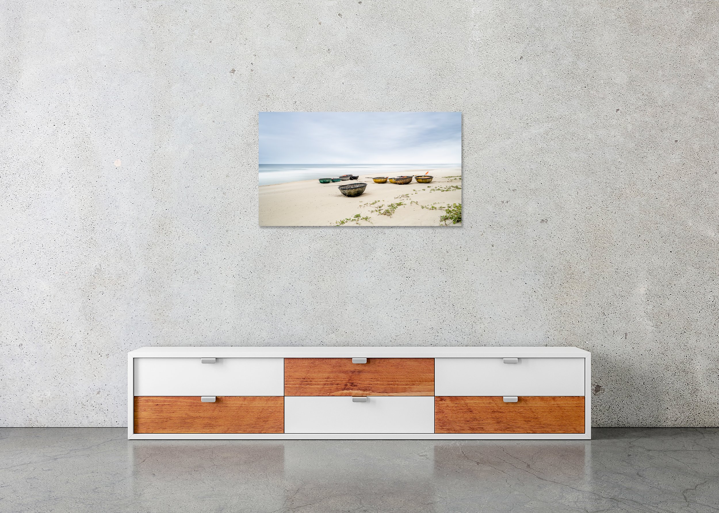 Traditional fishing boats on an empty beach beside a calm sea under a soft hazy sky, photo print mounted on Dibond, frameless.