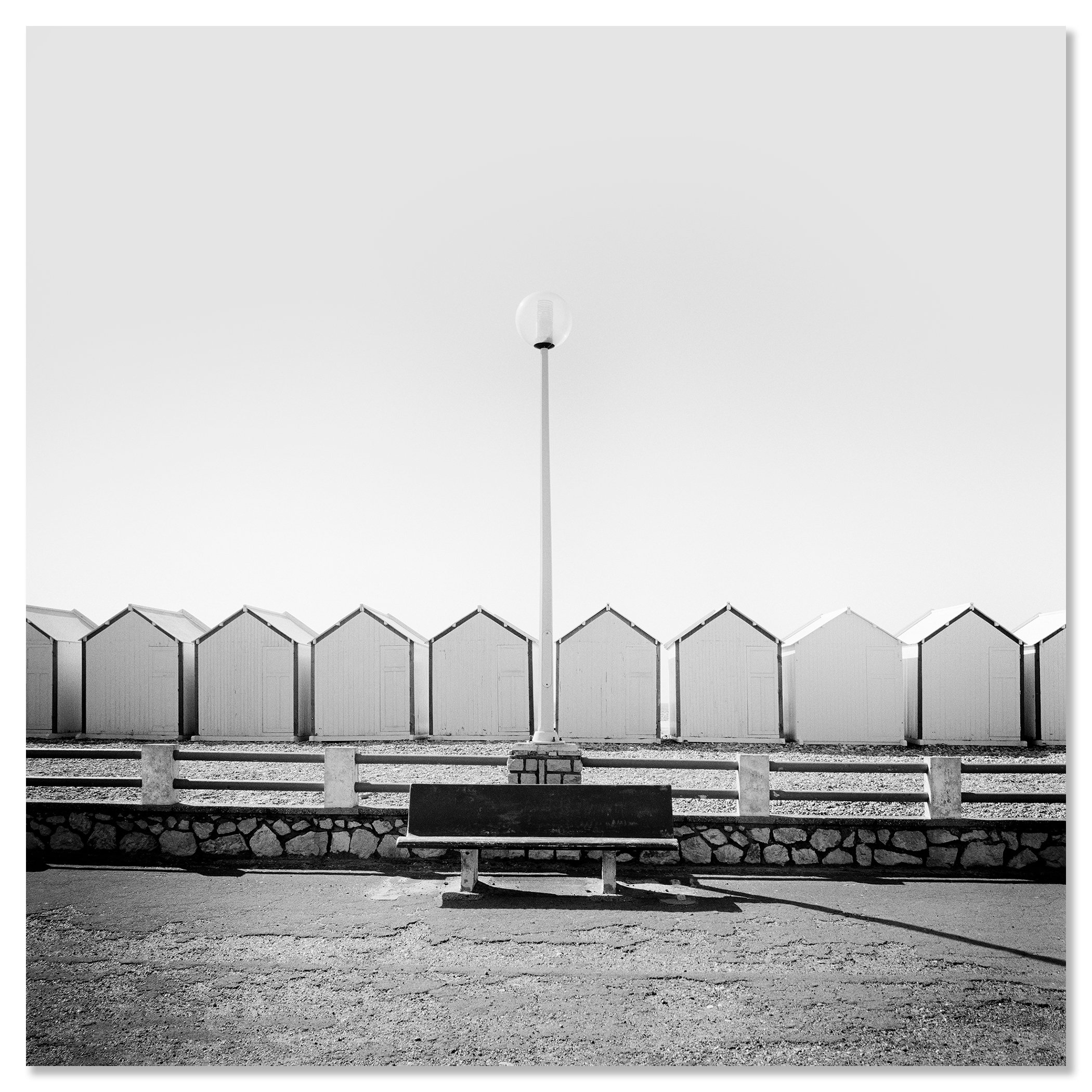 Bench on the Promenade Study 1 shown as a frameless aluminium Dibond print by Gerald Berghammer.