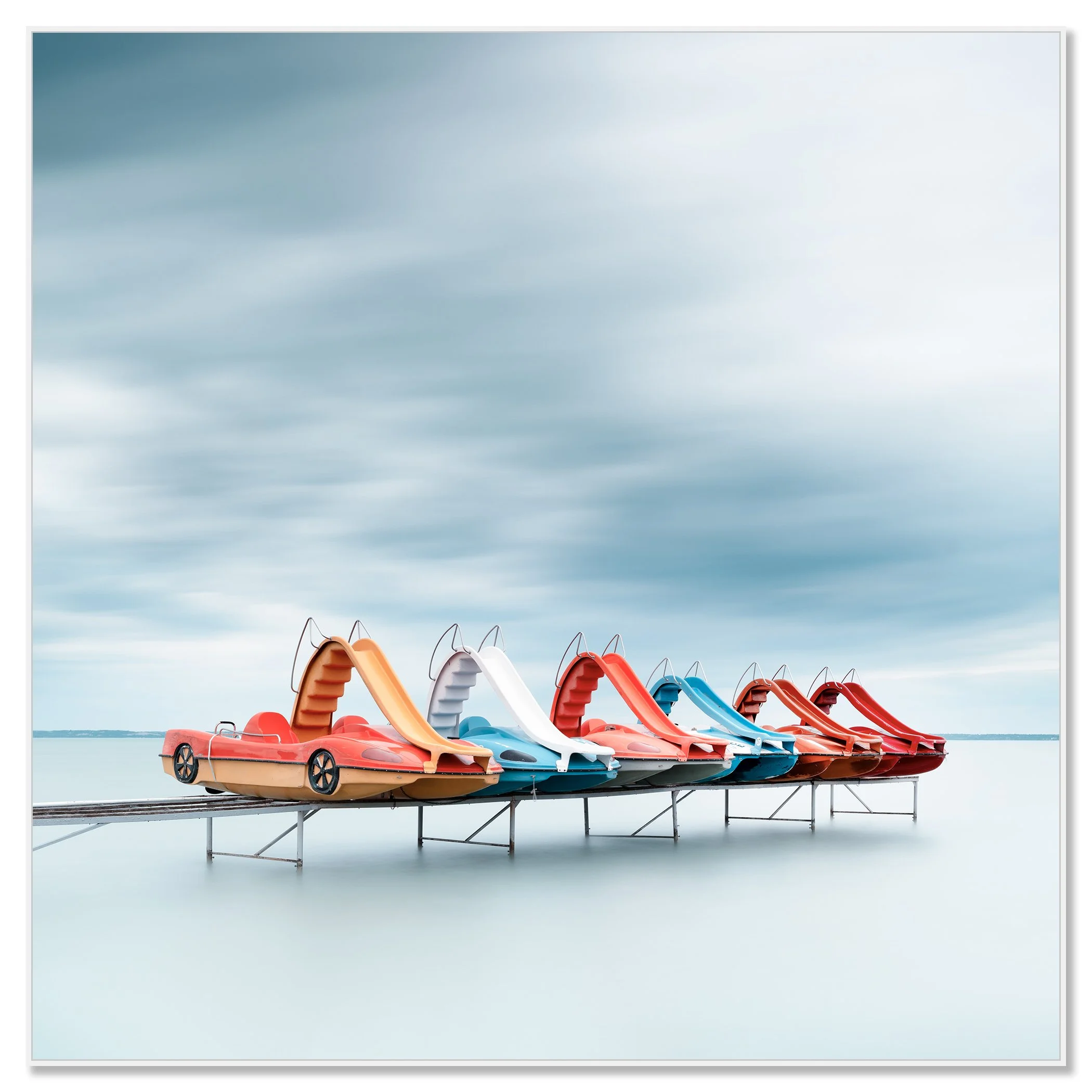 Row of Colourful Pedal Boats – Lake Balaton, colour photograph in a white aluminium ArtBox frame.