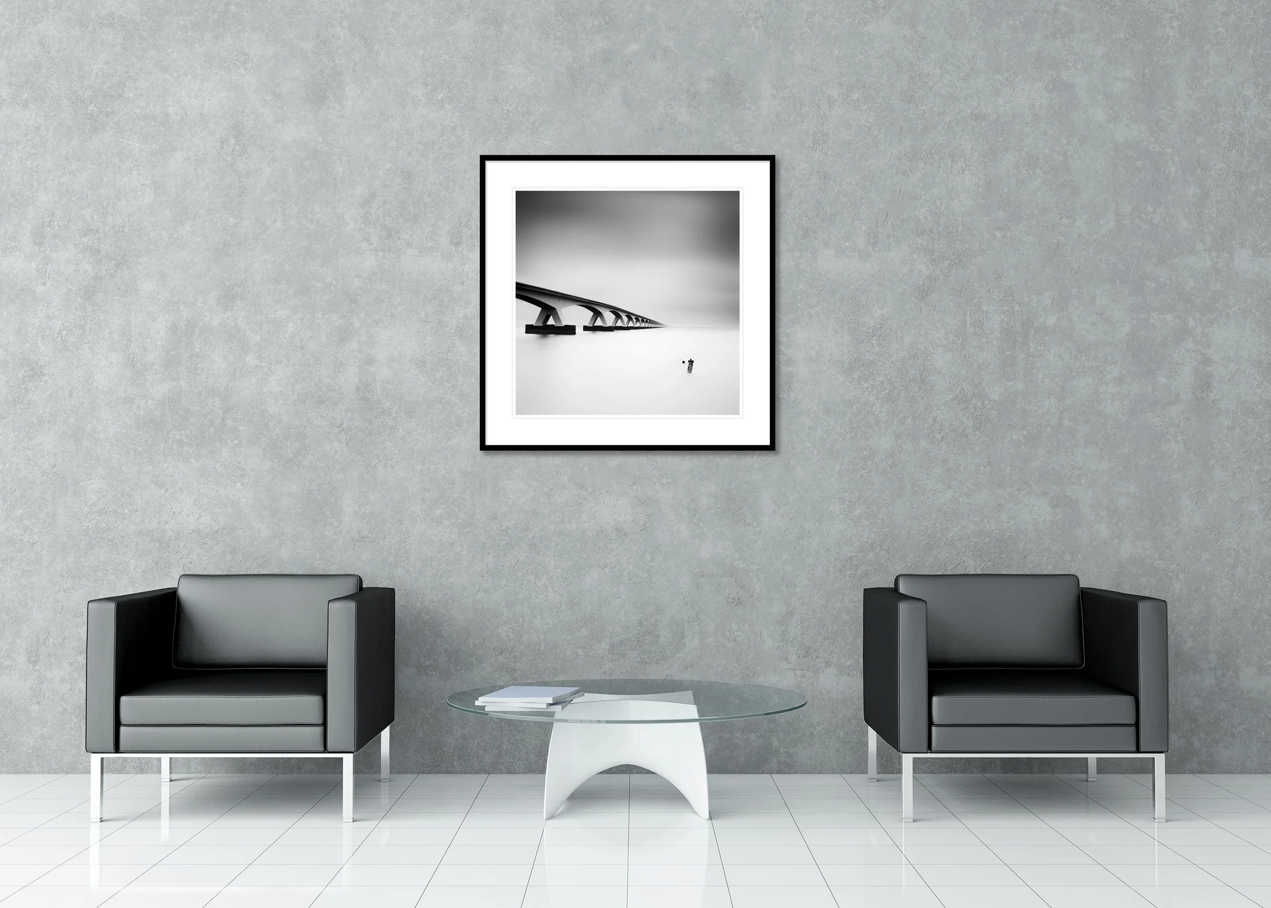 Zeeland Bridge Study 1 displayed in a modern interior as an archival pigment print in a black aluminium frame with a white mount by Gerald Berghammer.