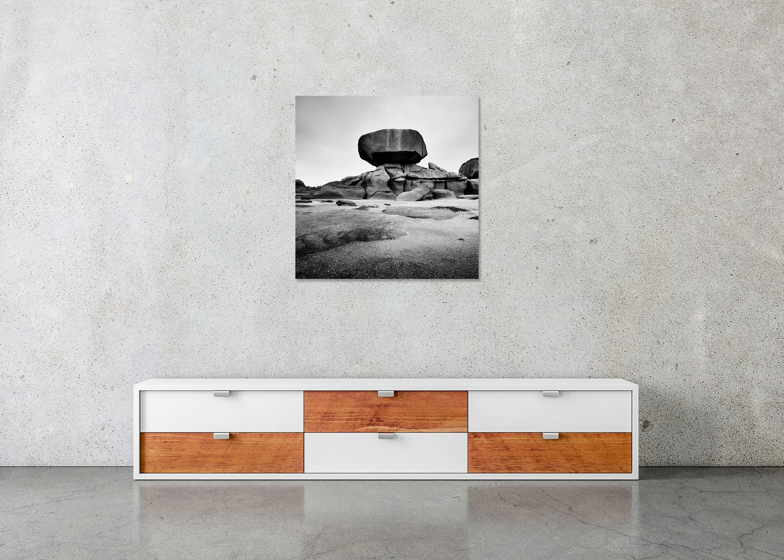 Pink Granite Coast Study 1 displayed in a modern interior as a frameless black-and-white artwork mounted on aluminium Dibond by Gerald Berghammer.
