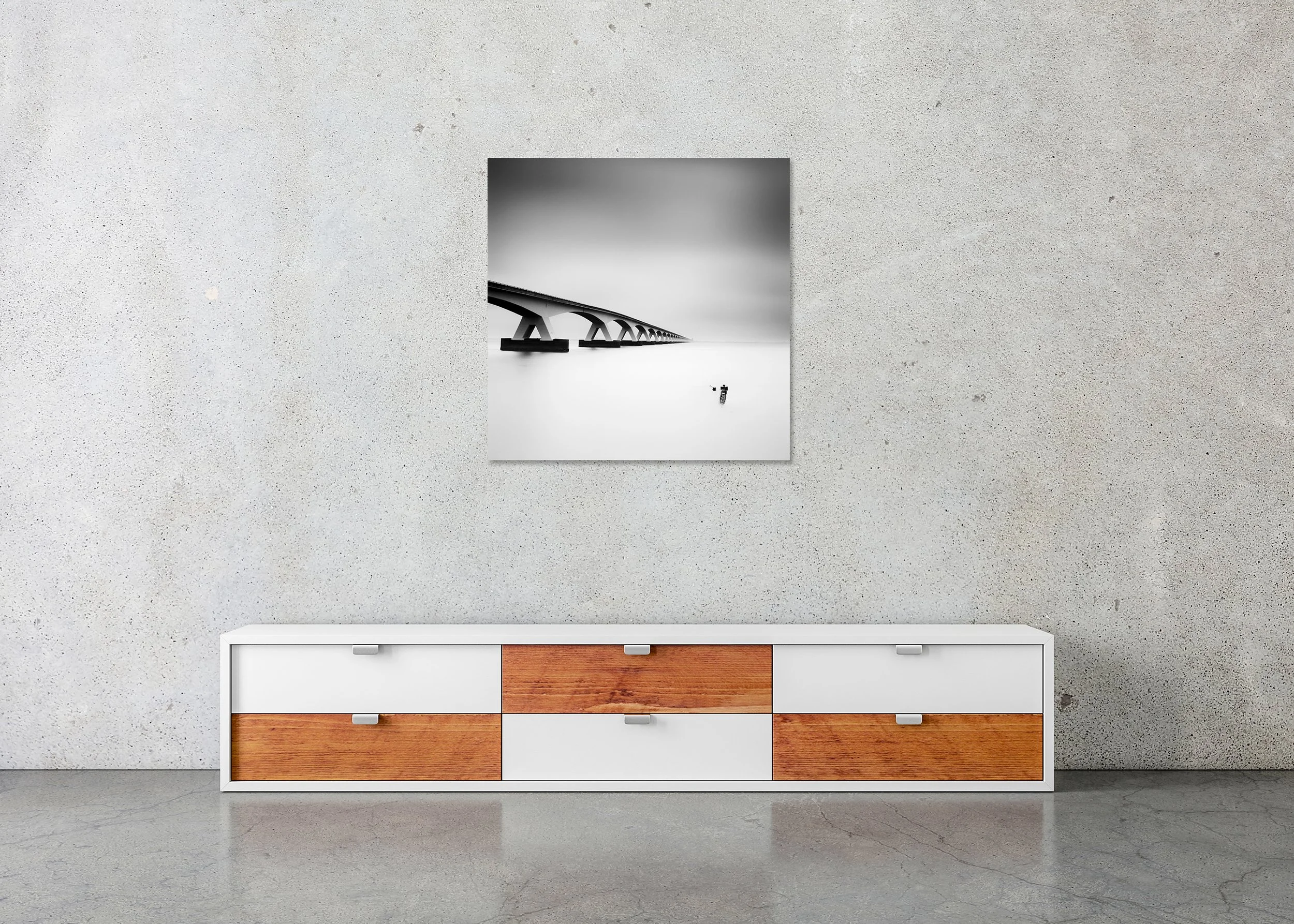 Zeeland Bridge Study 1 displayed in a modern interior as a frameless aluminium Dibond print by Gerald Berghammer.
