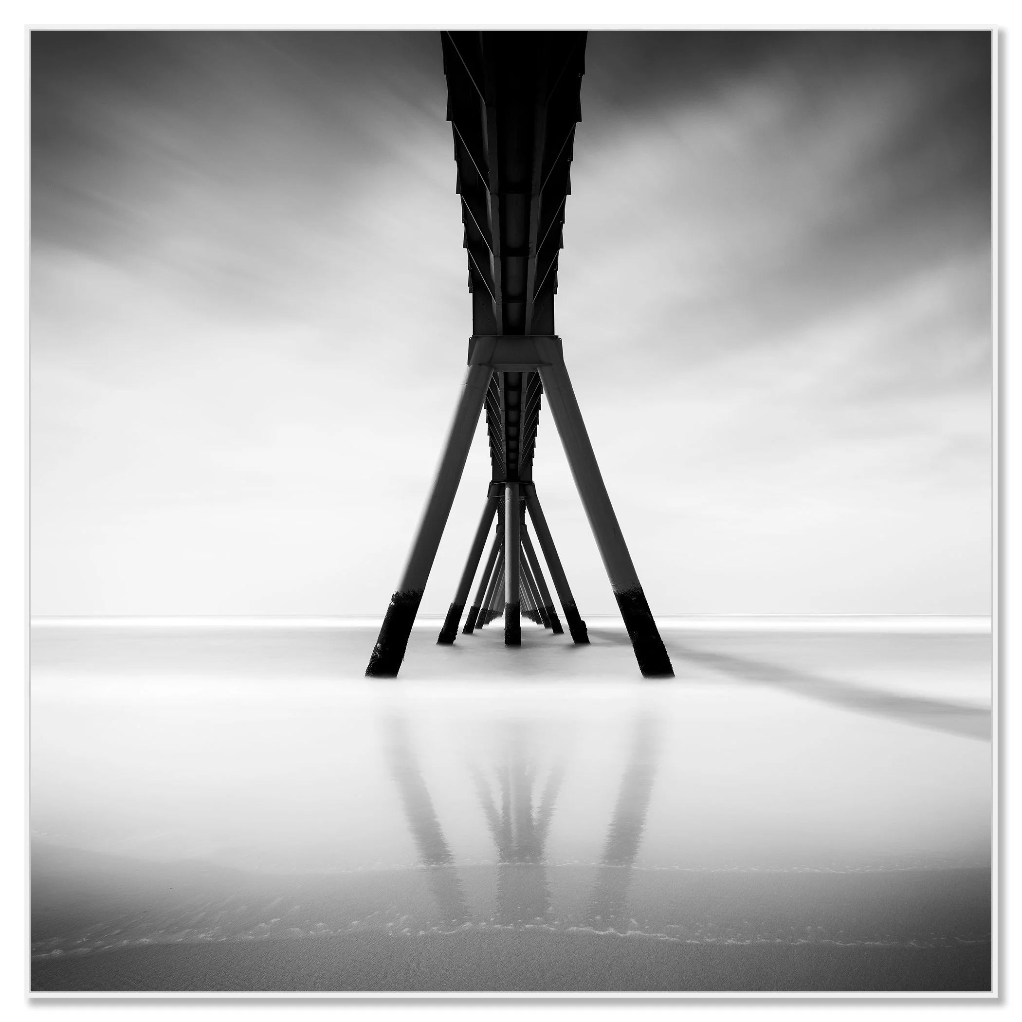 Wharf de la Salie pier on sandy beach in France, minimalist black-and-white fine art photograph of a coastal seascape – framed ArtBox white