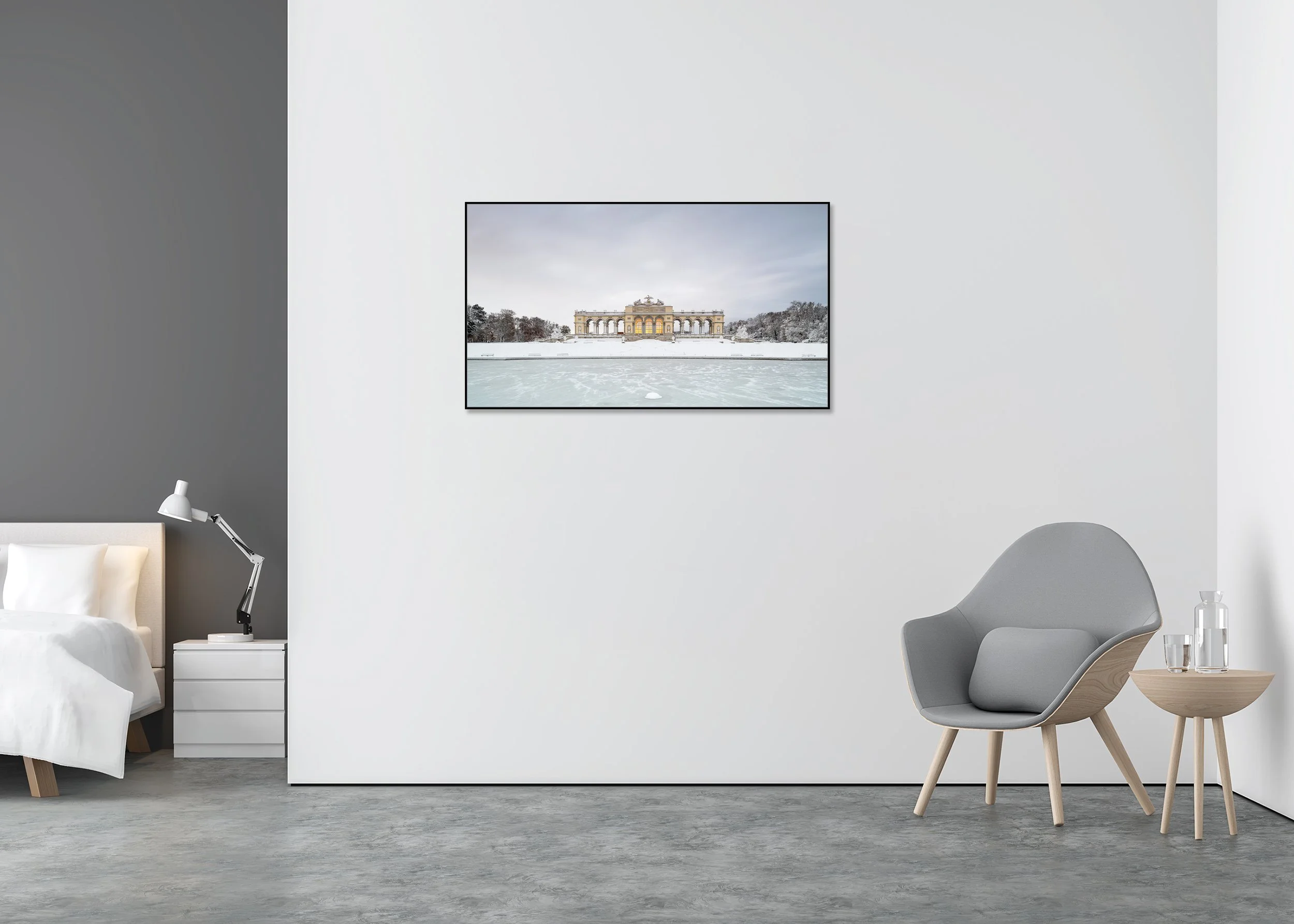 Snow-Covered Gloriette displayed in a modern interior, mounted on aluminium Dibond in a black ArtBox frame by Gerald Berghammer.