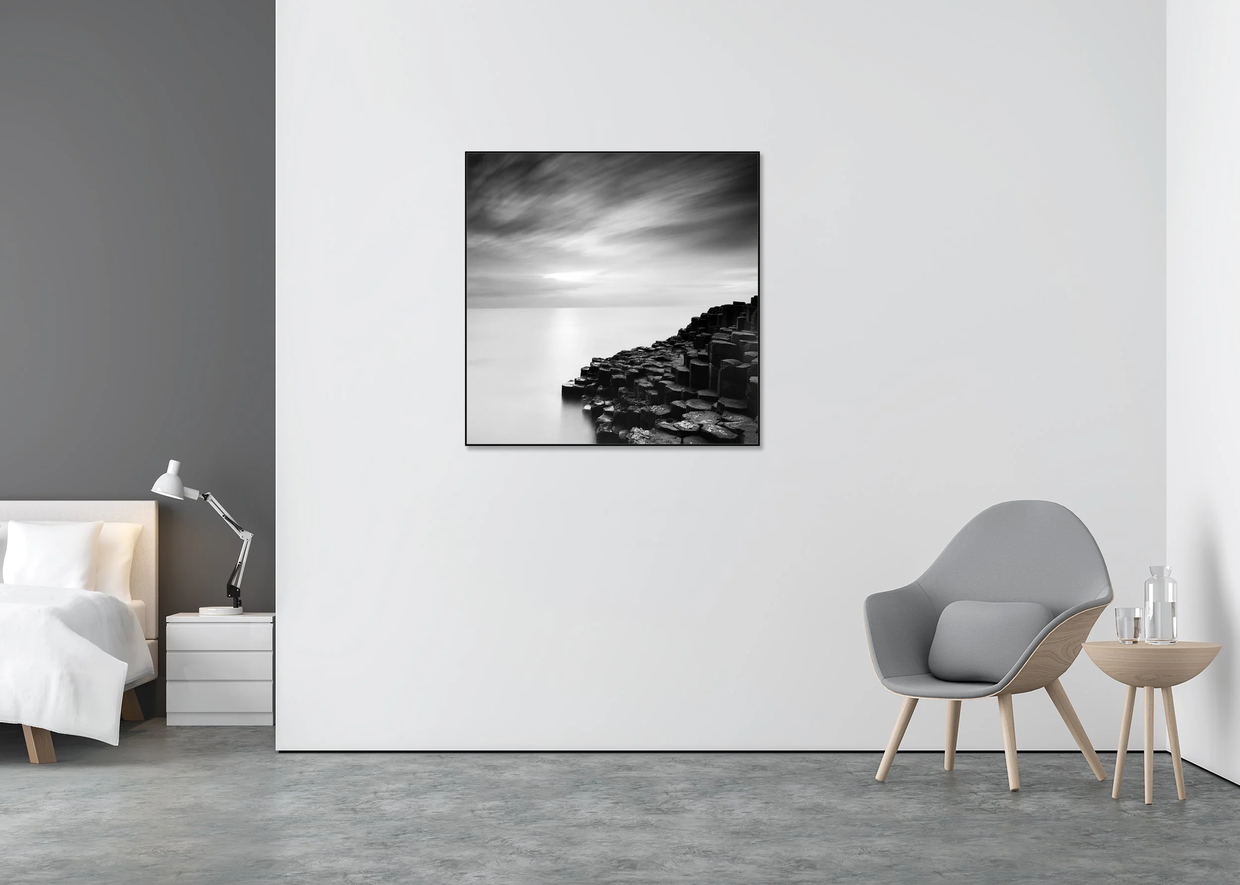 Giant’s Causeway Study 3 by Gerald Berghammer, black-and-white photograph in a black aluminium ArtBox frame displayed in a minimalist bedroom interior.