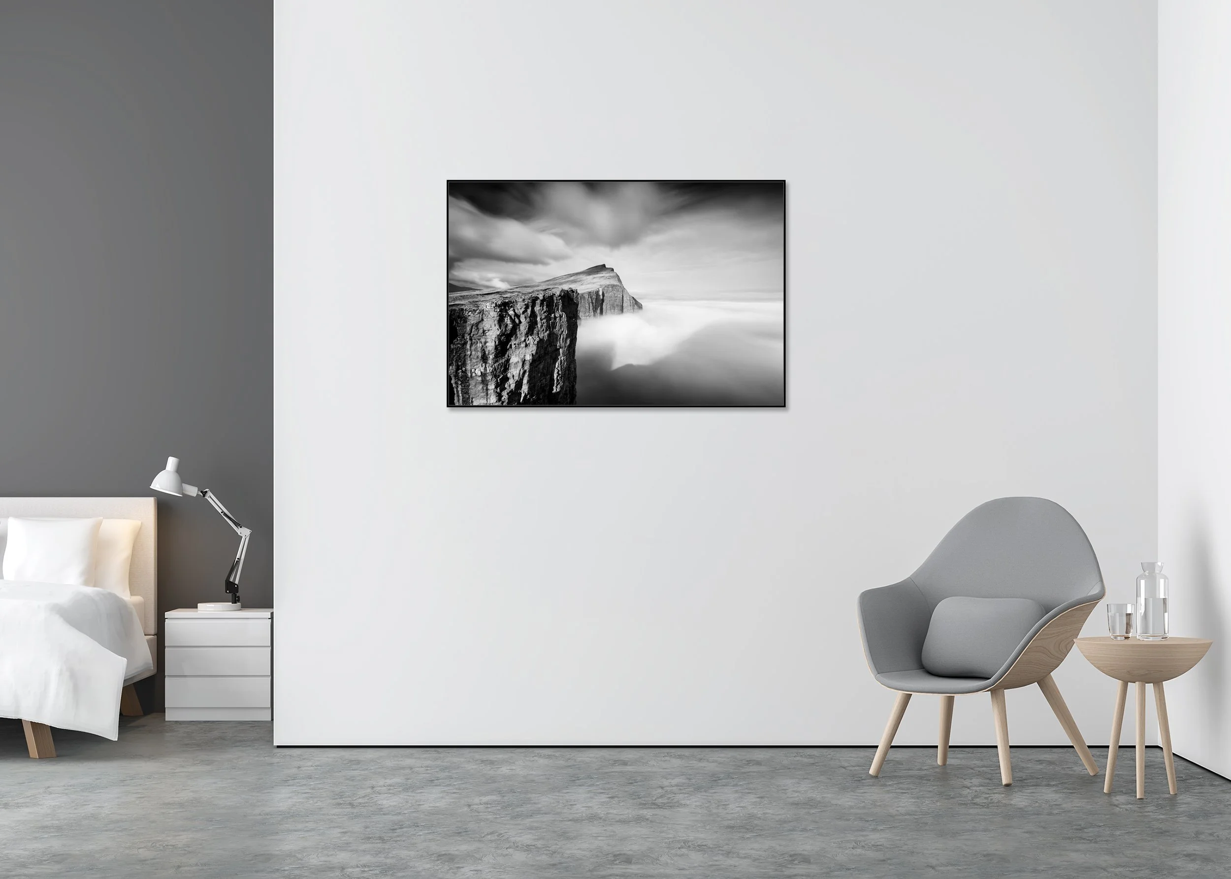 Foggy Slave Cliff, Study 1 – Faroe Islands, black-and-white photograph on Dibond in a black aluminium ArtBox displayed in a minimalist interior. Photo by Gerald Berghammer.