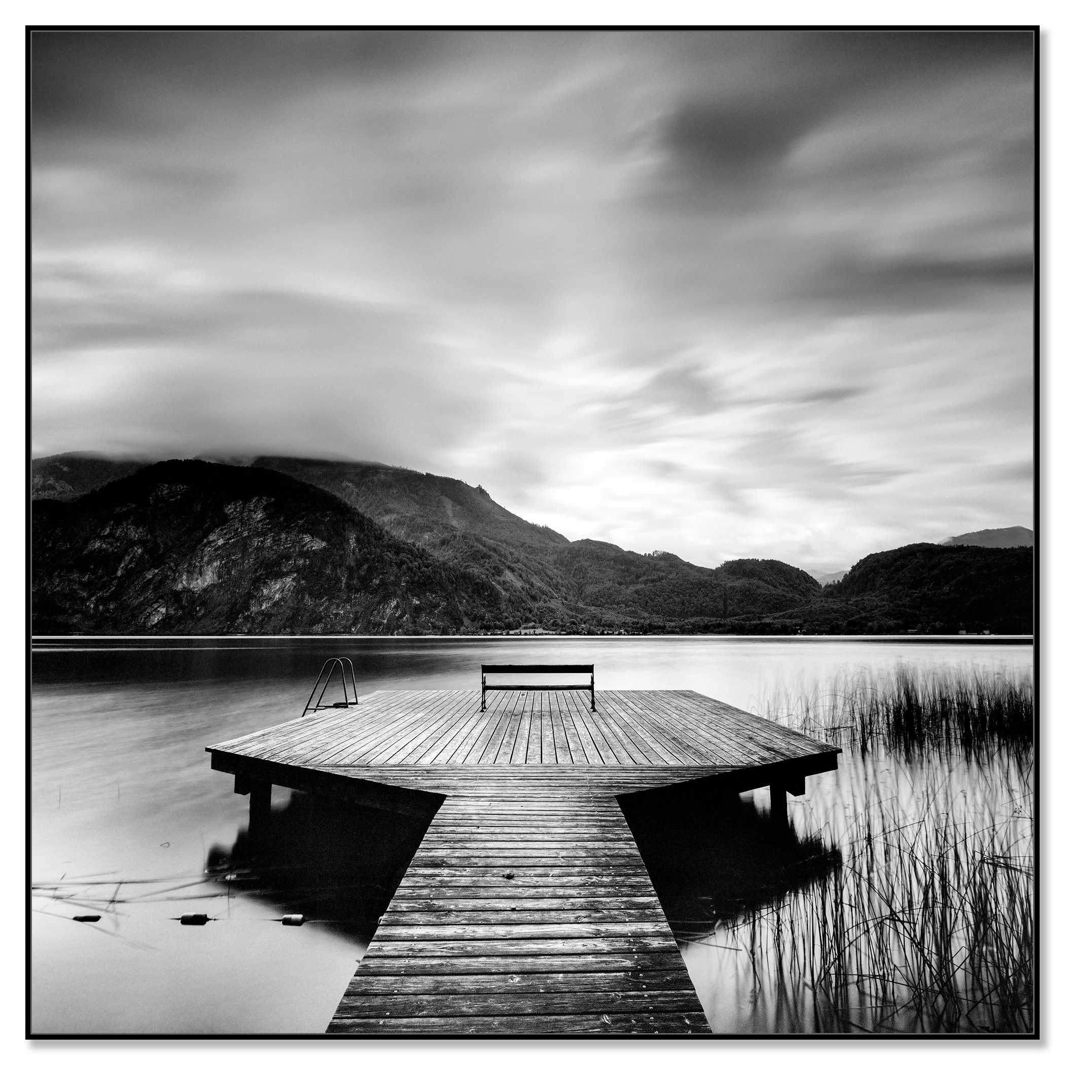 Wood Pier Study 2 – Austria, black-and-white photograph in a black aluminium ArtBox frame