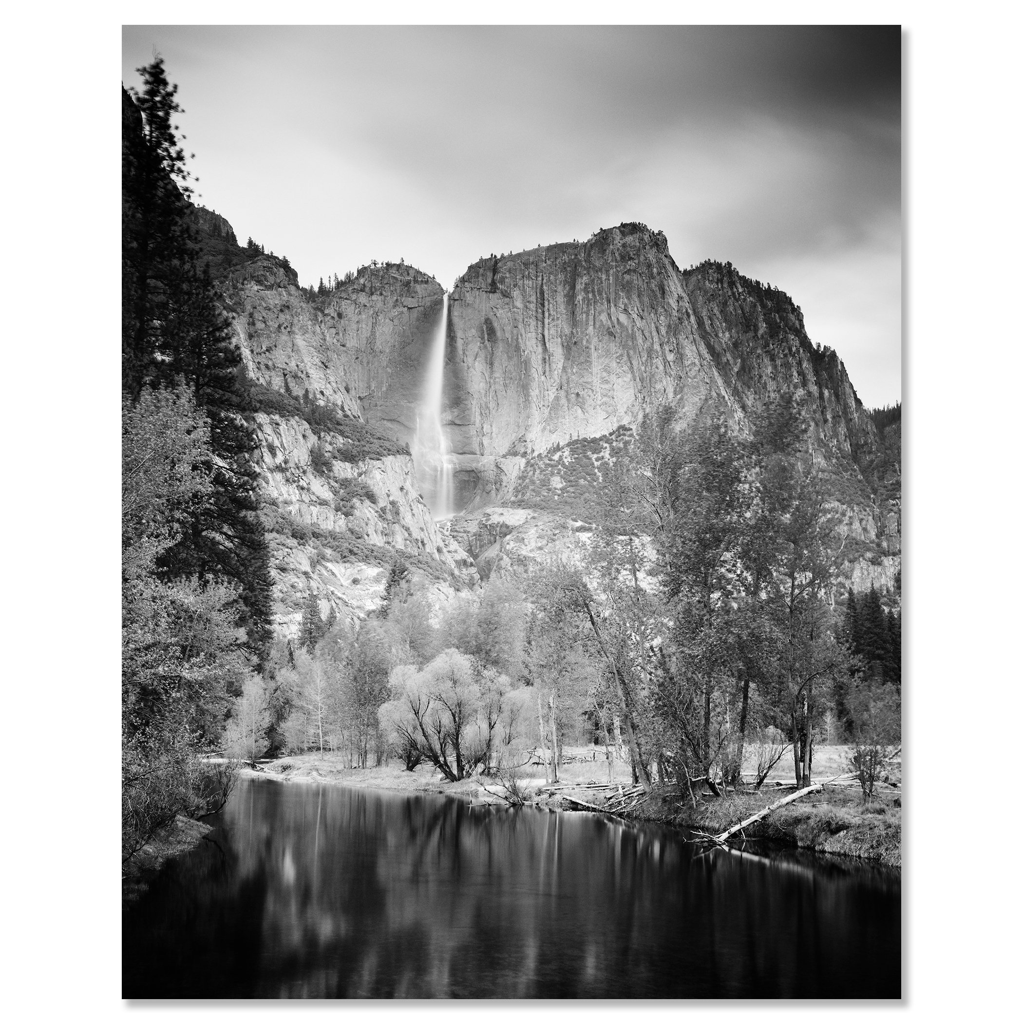 © 2015 Gerald Berghammer - Black and white american landscaspe photography. Mountain landscape with a waterfall, trees, and a calm river in the foreground. Chromaluxe frameless