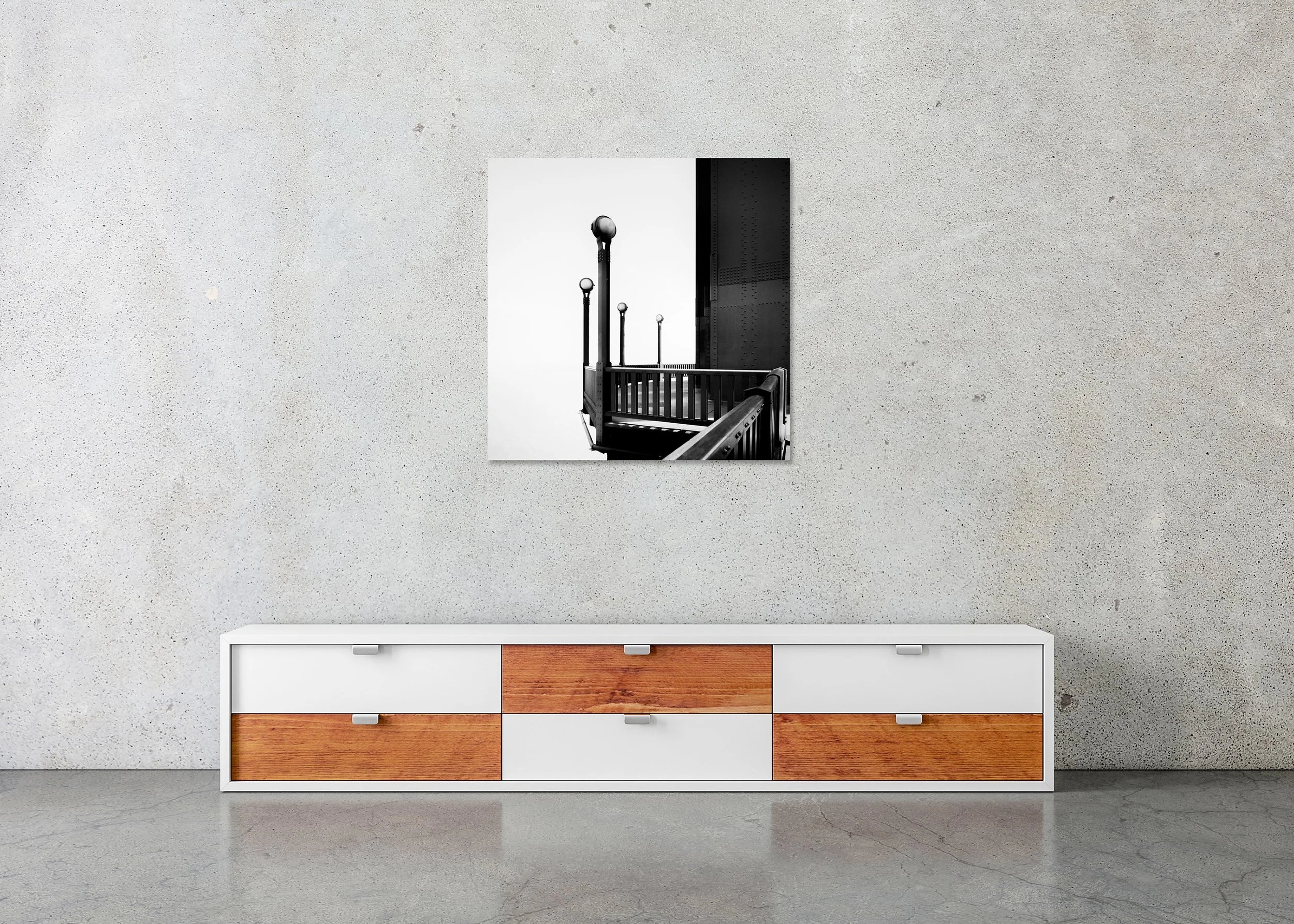 Golden Gate Study 9 displayed above a low cabinet as a frameless black-and-white aluminium Dibond print by Gerald Berghammer.