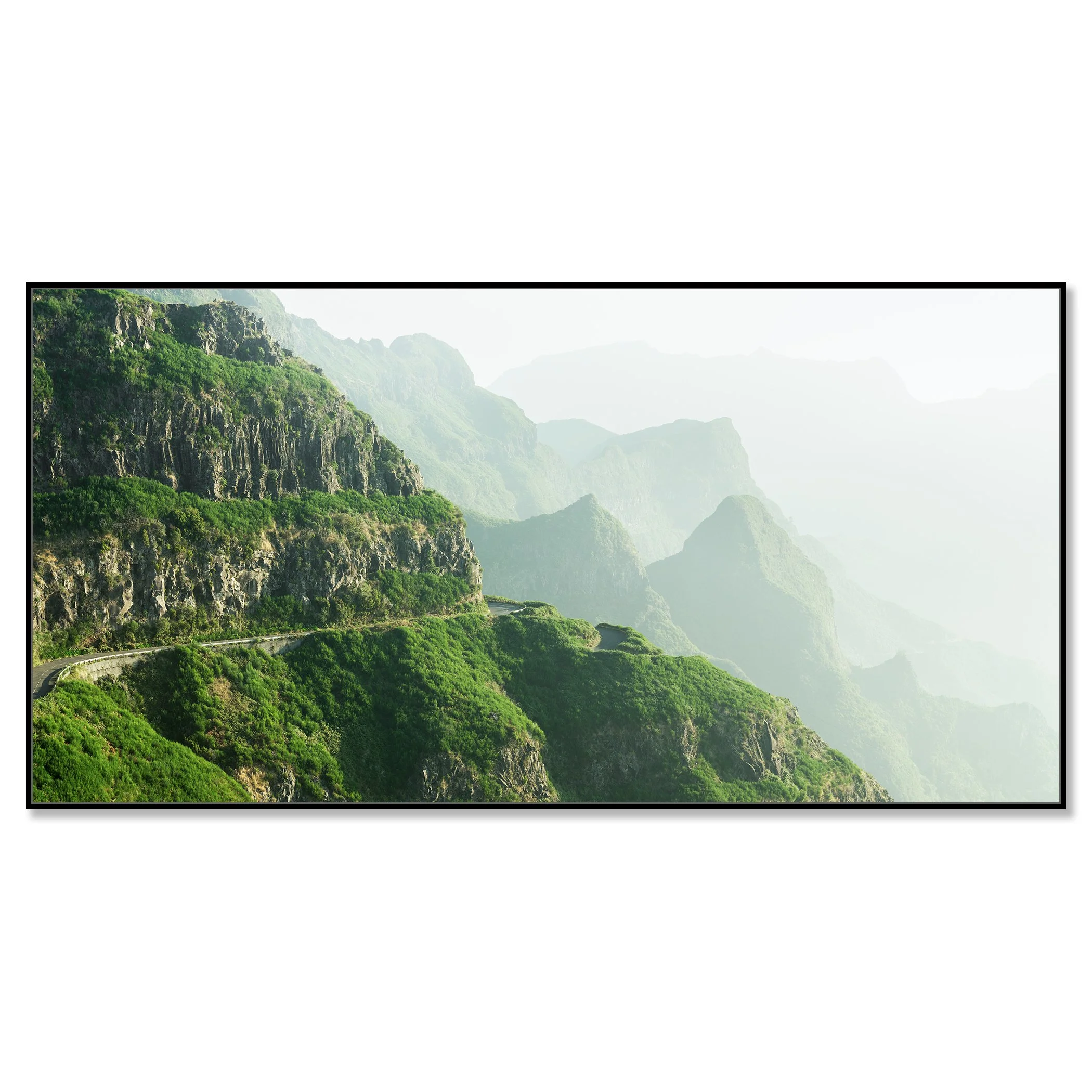 © 2021 Gerald Berghammer - Color Fine Art Landscape Photography. A winding mountain road through lush green cliffs and misty mountains in the background. Chromaluxe framed black