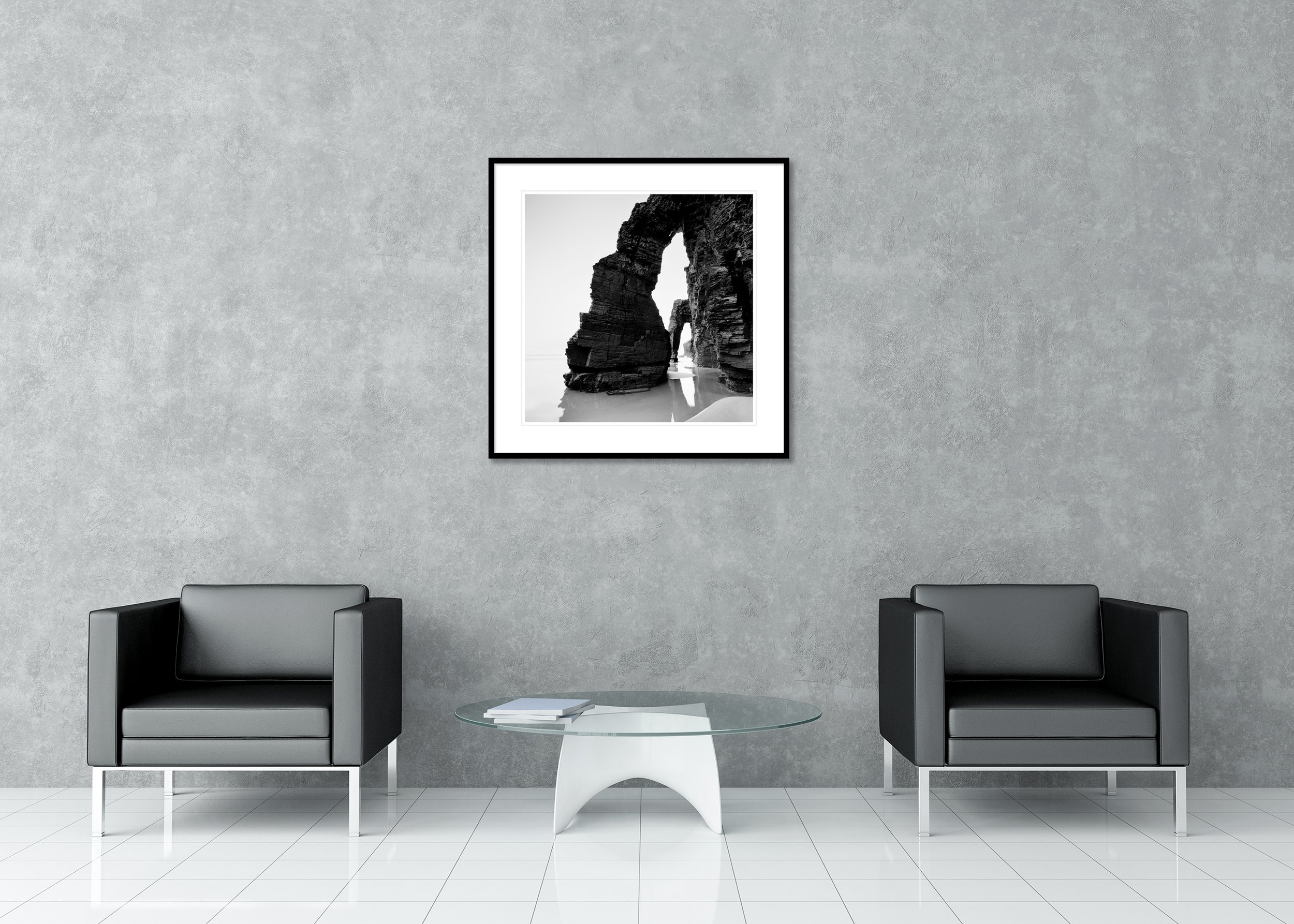 Arches on Catedrais Beach Study 4 displayed in a modern interior as an archival pigment print in a black aluminium frame with a white mount by Gerald Berghammer.
