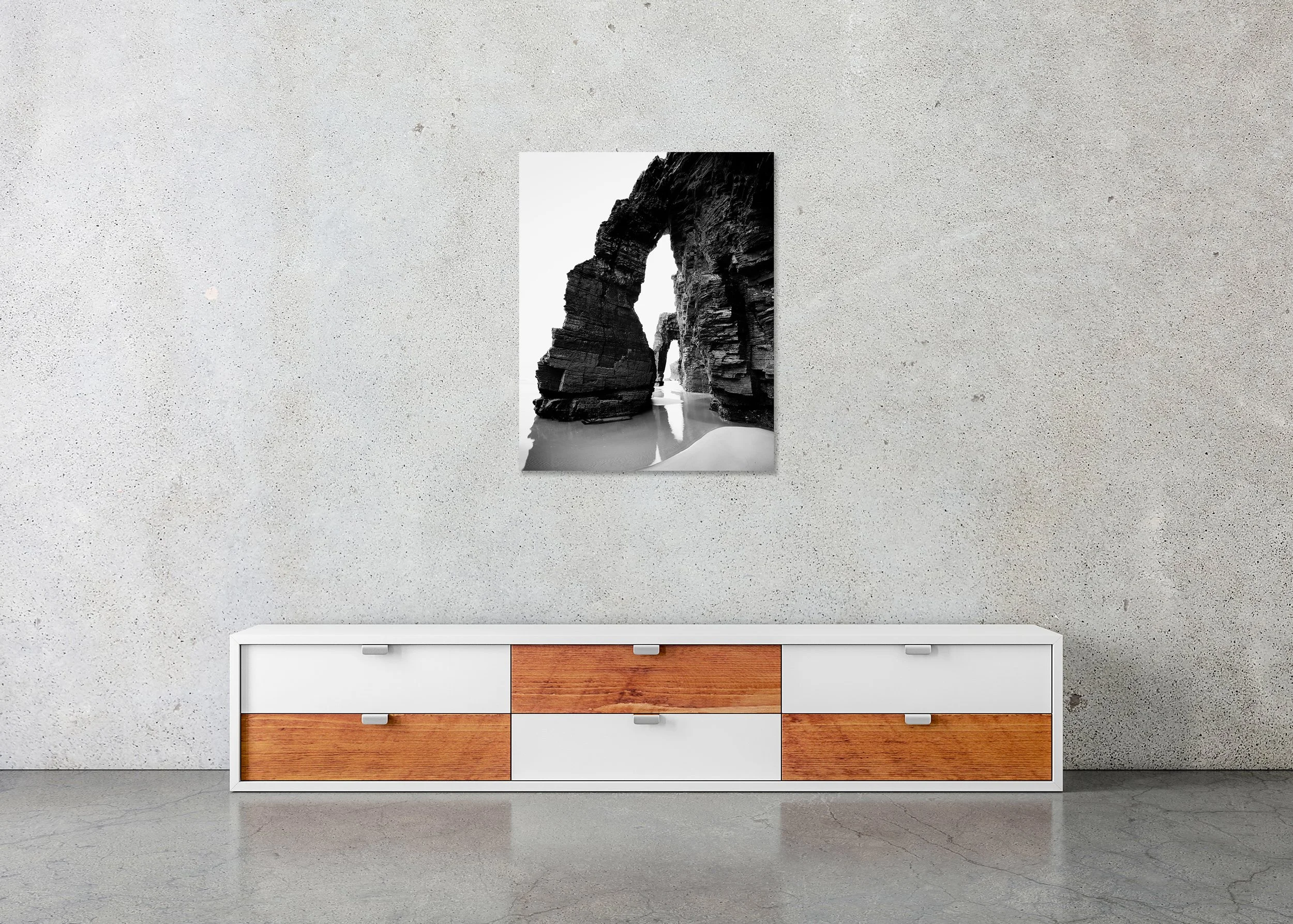 Minimalist black and white long-exposure seascape of a rock arch formation with wet sand reflections, ChromaLuxe metal print, frameless.